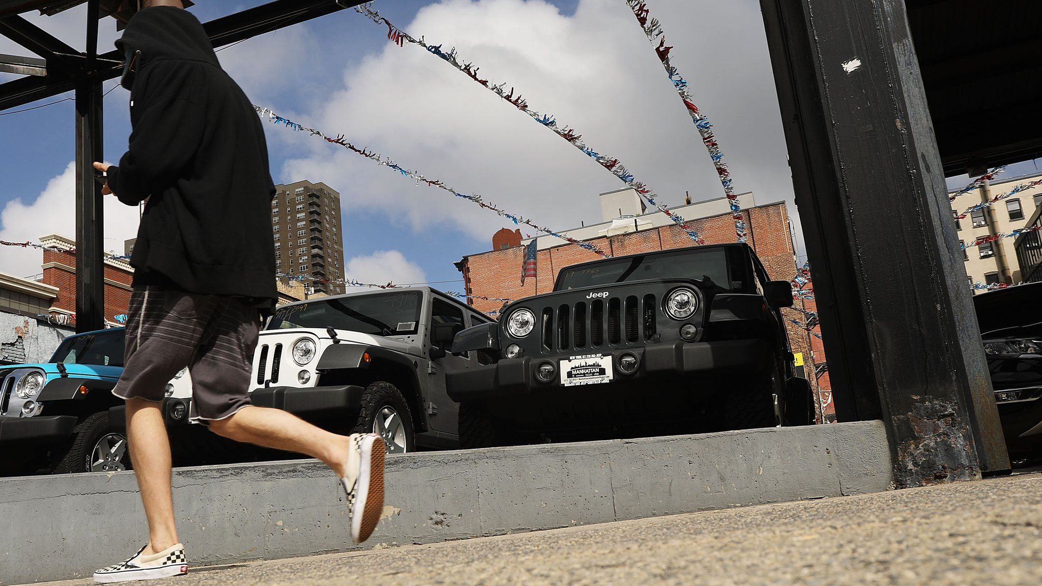 Jeep Wranglers are displayed at a Manhattan Fiat Chrysler dealership on July 23, 2018 in New York City.