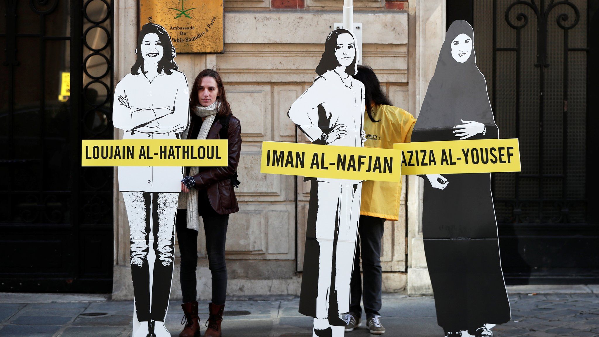 Amnesty International urges Saudi authorities to release activists Loujain al-Hathloul, Eman al-Nafjan and Aziza al-Yousef, outside the Saudi Arabian embassy in Paris, March 8, 2019