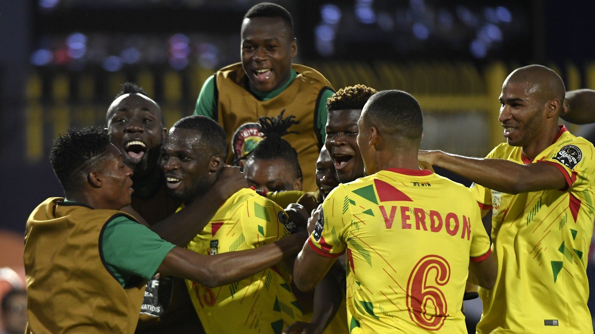 Benin's players celebrate scoring against Morocco at the Africa Cup of Nations