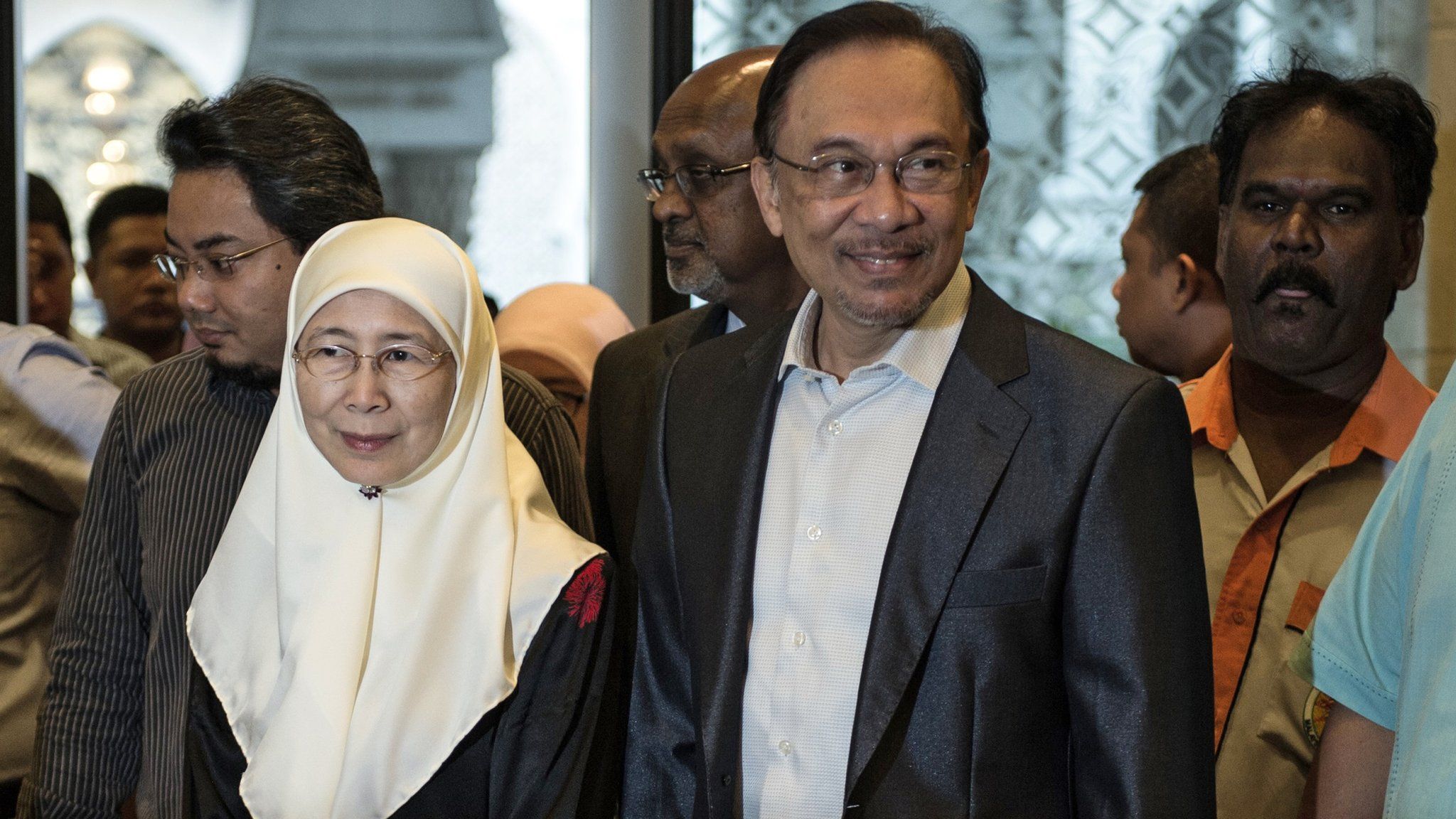 File photo: Anwar Ibrahim (C) and his wife Wan Azizah in 2014