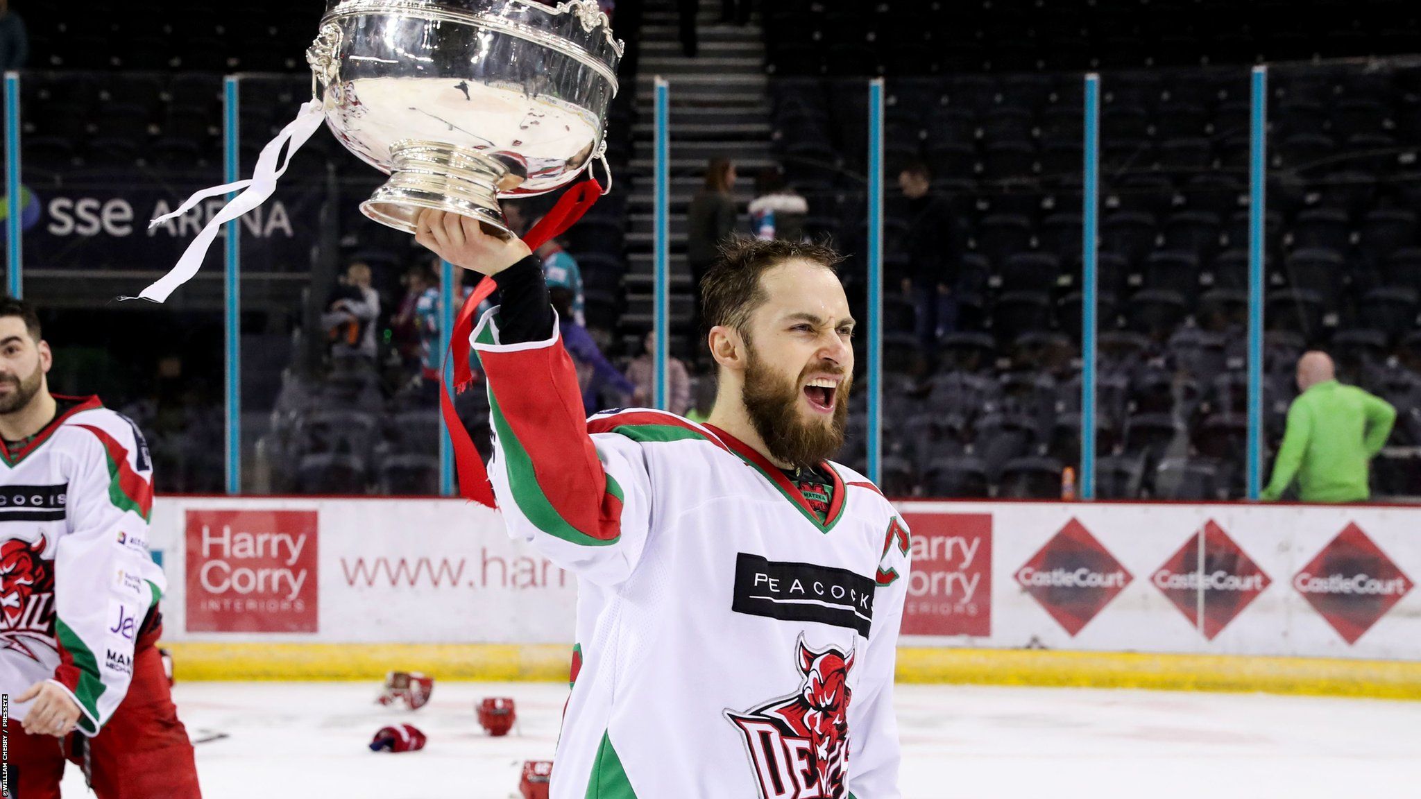 Cardiff Devils team celebrate with trophy