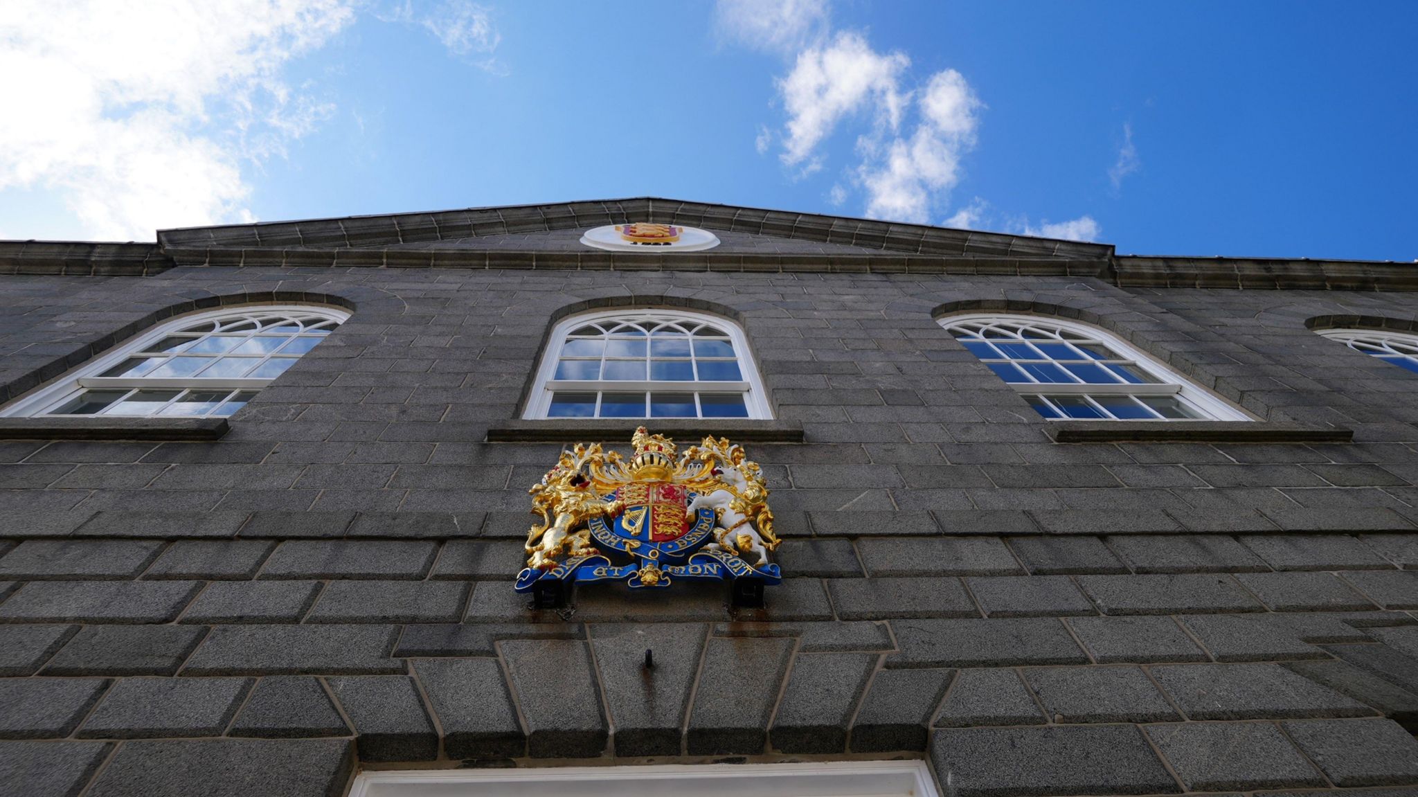 Crest and windows on the Guernsey Royal Court building