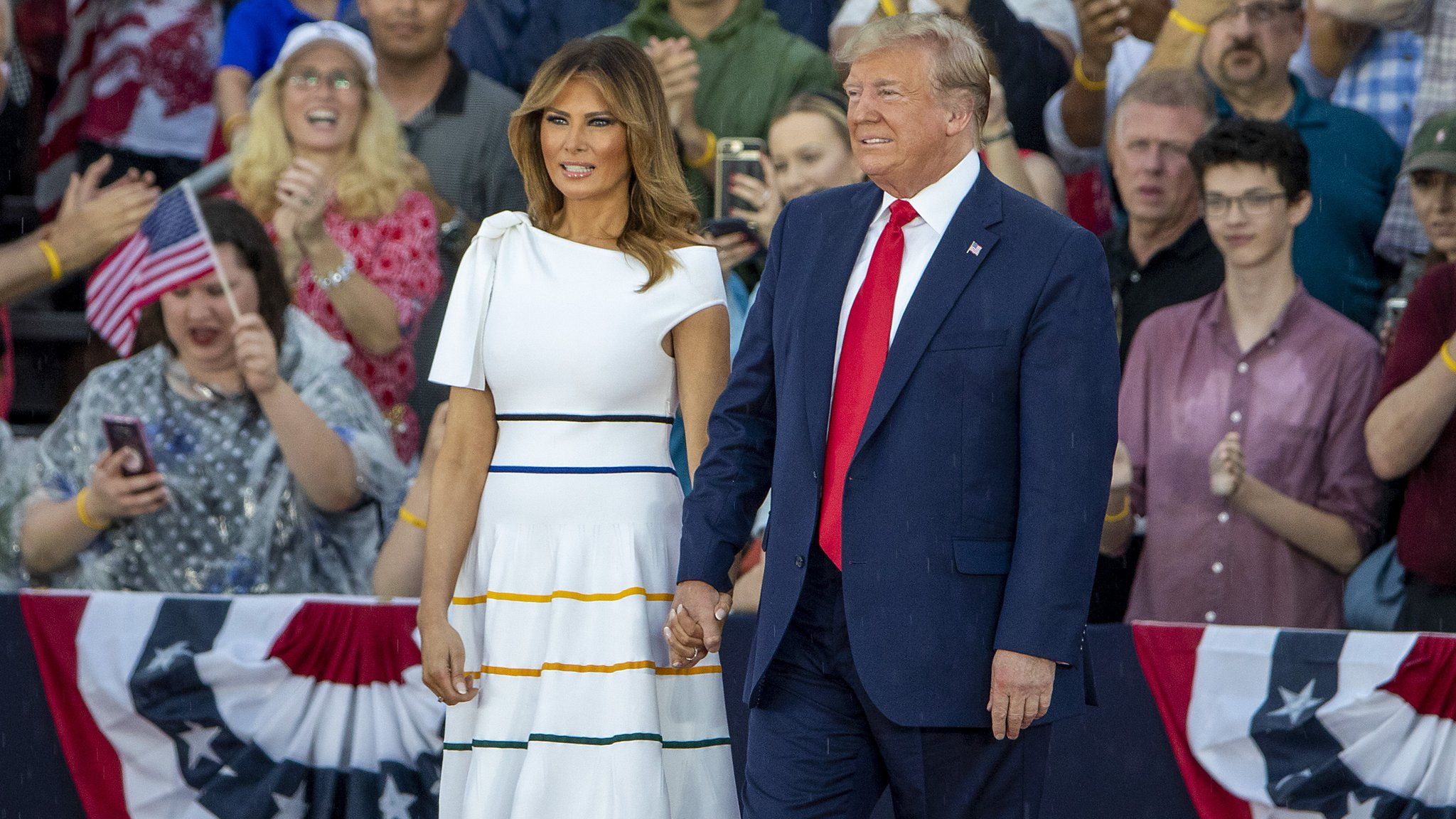 President Donald Trump and first lady Melania Trump take the stage on July 04, 2019 in Washington.