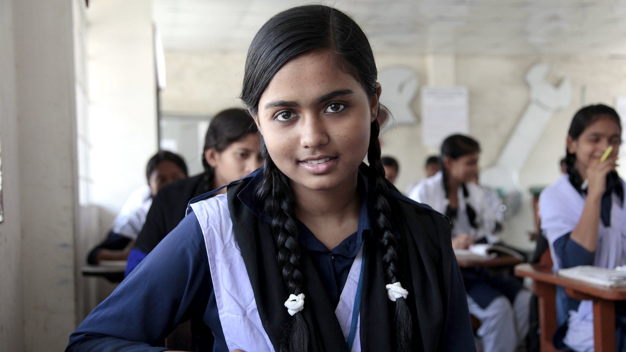Mim Akter, 16, seen in a school in Bangladesh in a handout photo from the former Department for International Development