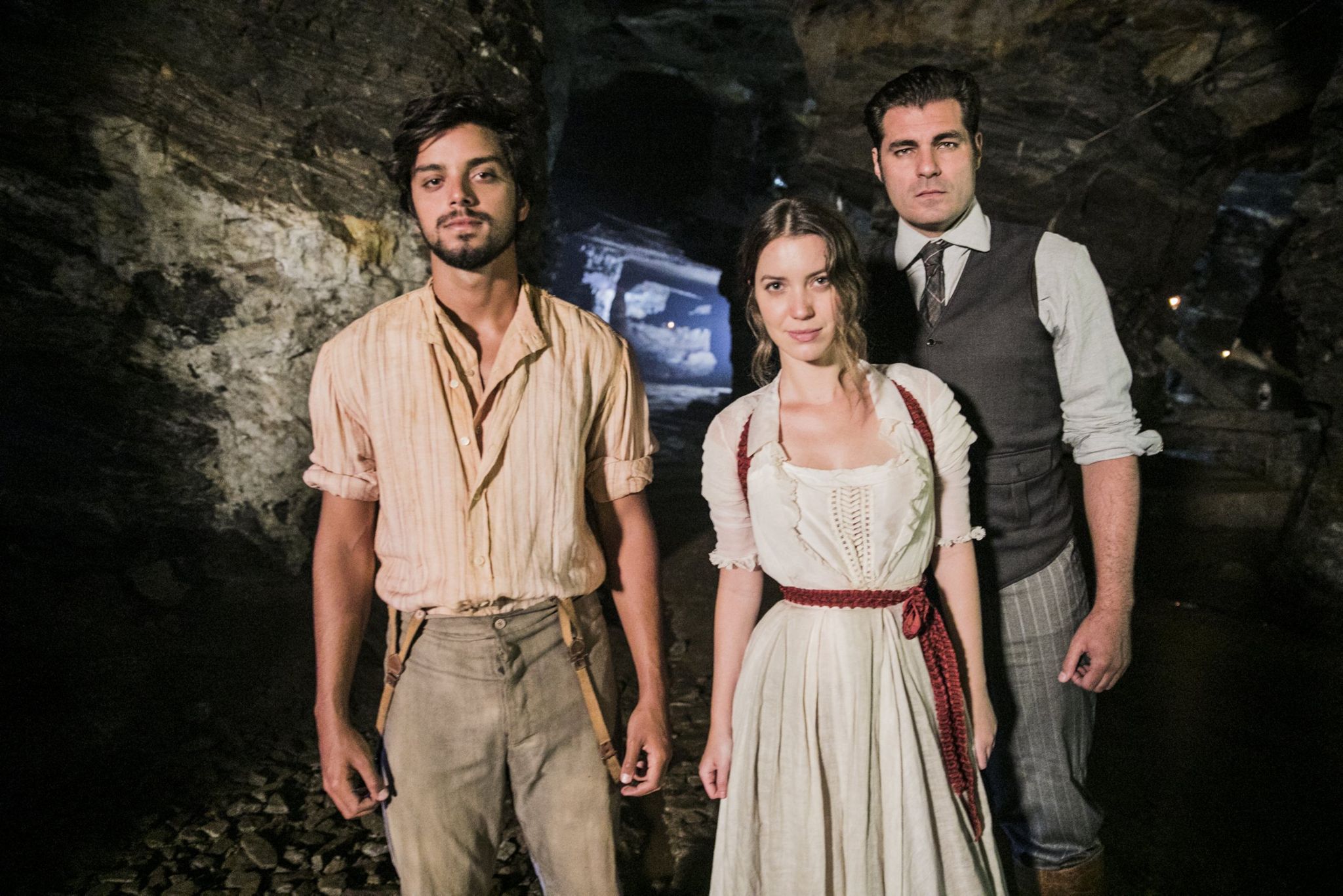 Three characters in the soap opera pictured in a mine