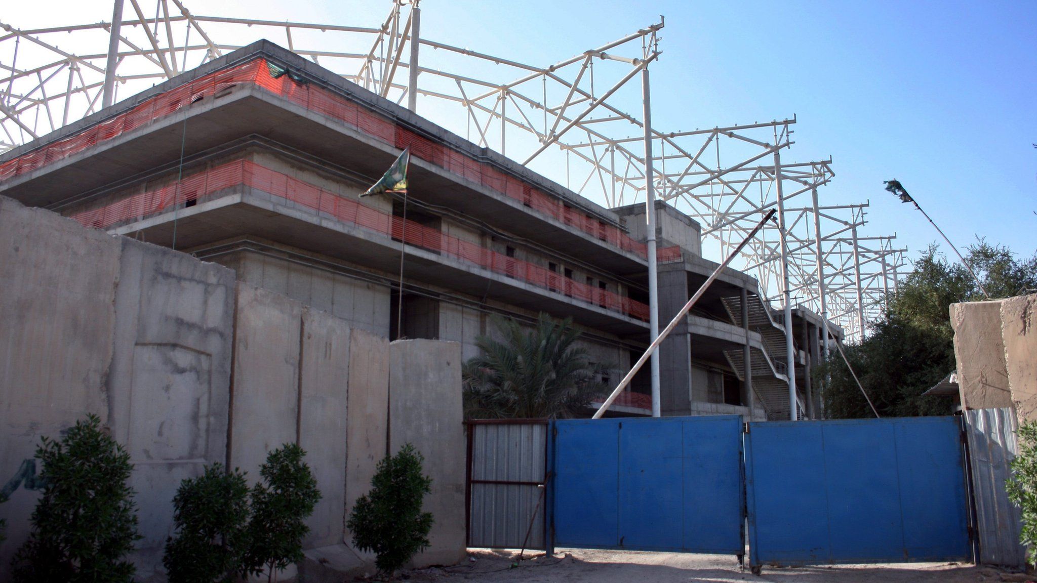 Entrance to a sports stadium under construction in Baghdad's Sadr City district (2 September 2015)