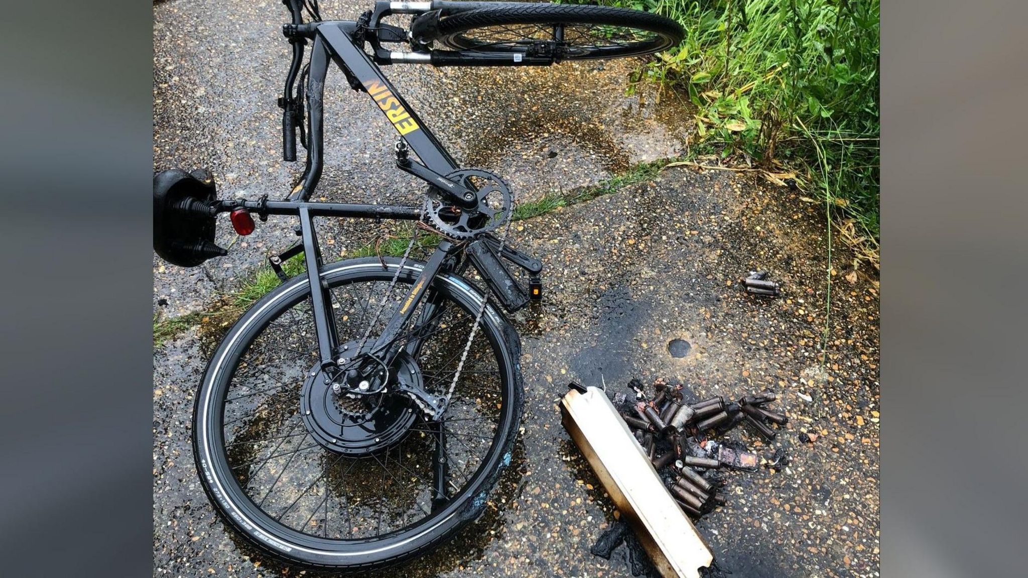 A damaged e-bike with burned parts 