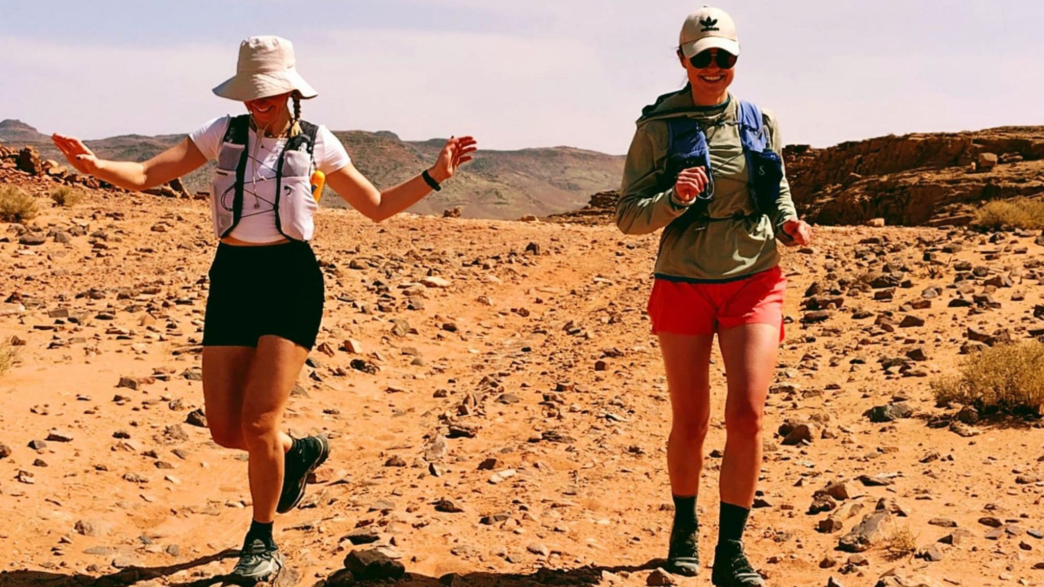 Philippa Morris and another runner in the desert