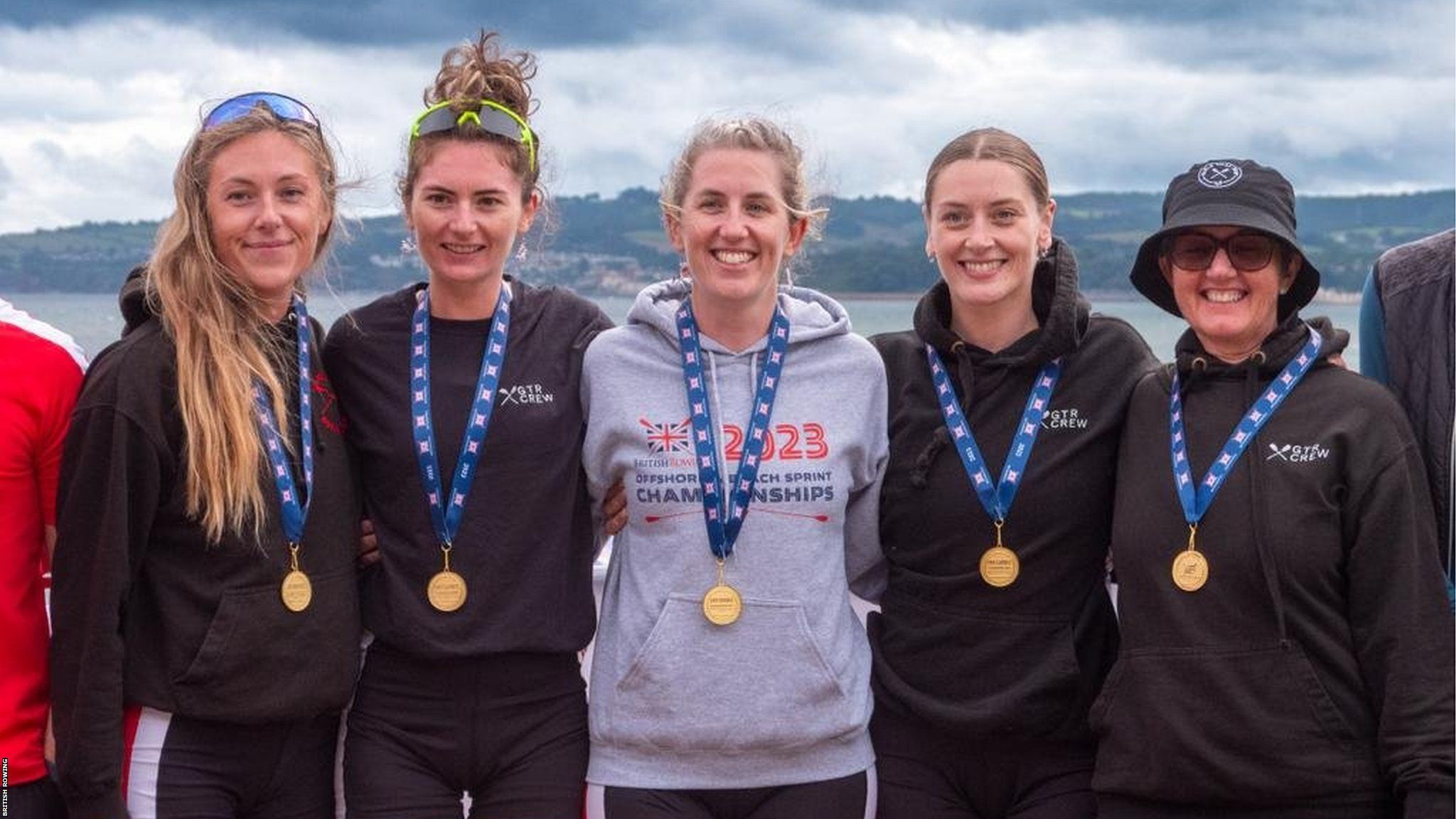 Jersey women coxless four with their gold medals