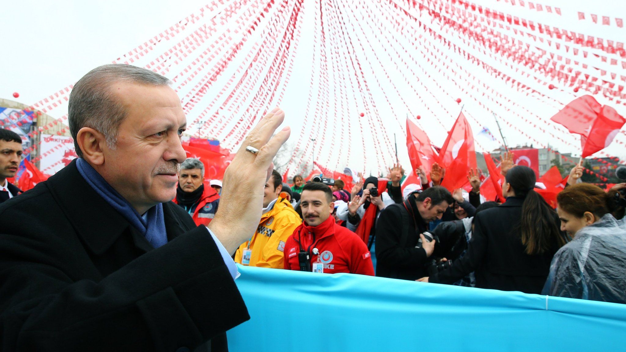 A handout photo made available by the Turkish President Press office shows Turkish President Recep Tayyip Erdogan waves to supporters during the opening ceremony for various facilities in Sakarya city, Turkey, 16 March 2017