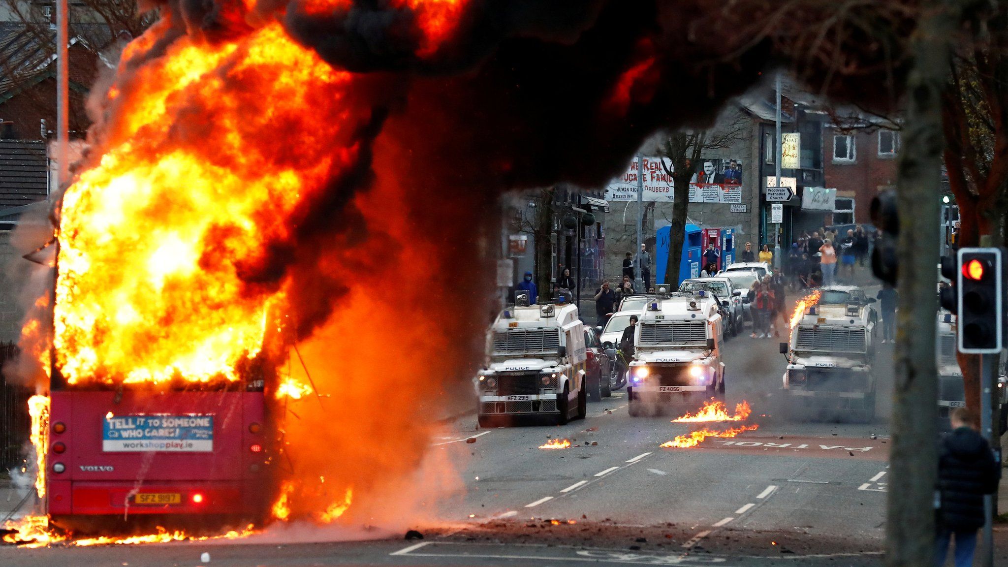 A bus burns in Belfast following rioting