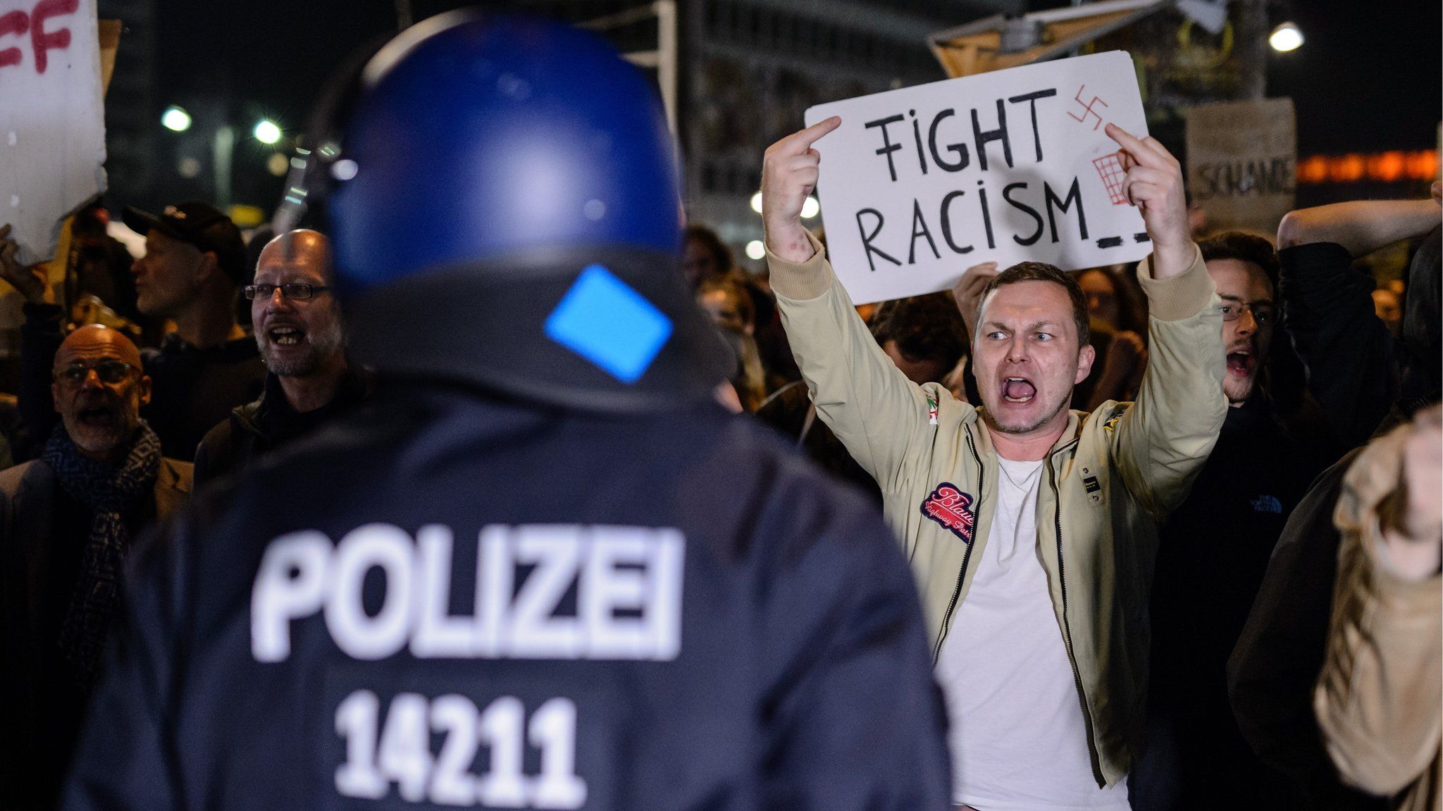 Opponents of the Alternative for Germany (AfD) protest against the result of the German election
