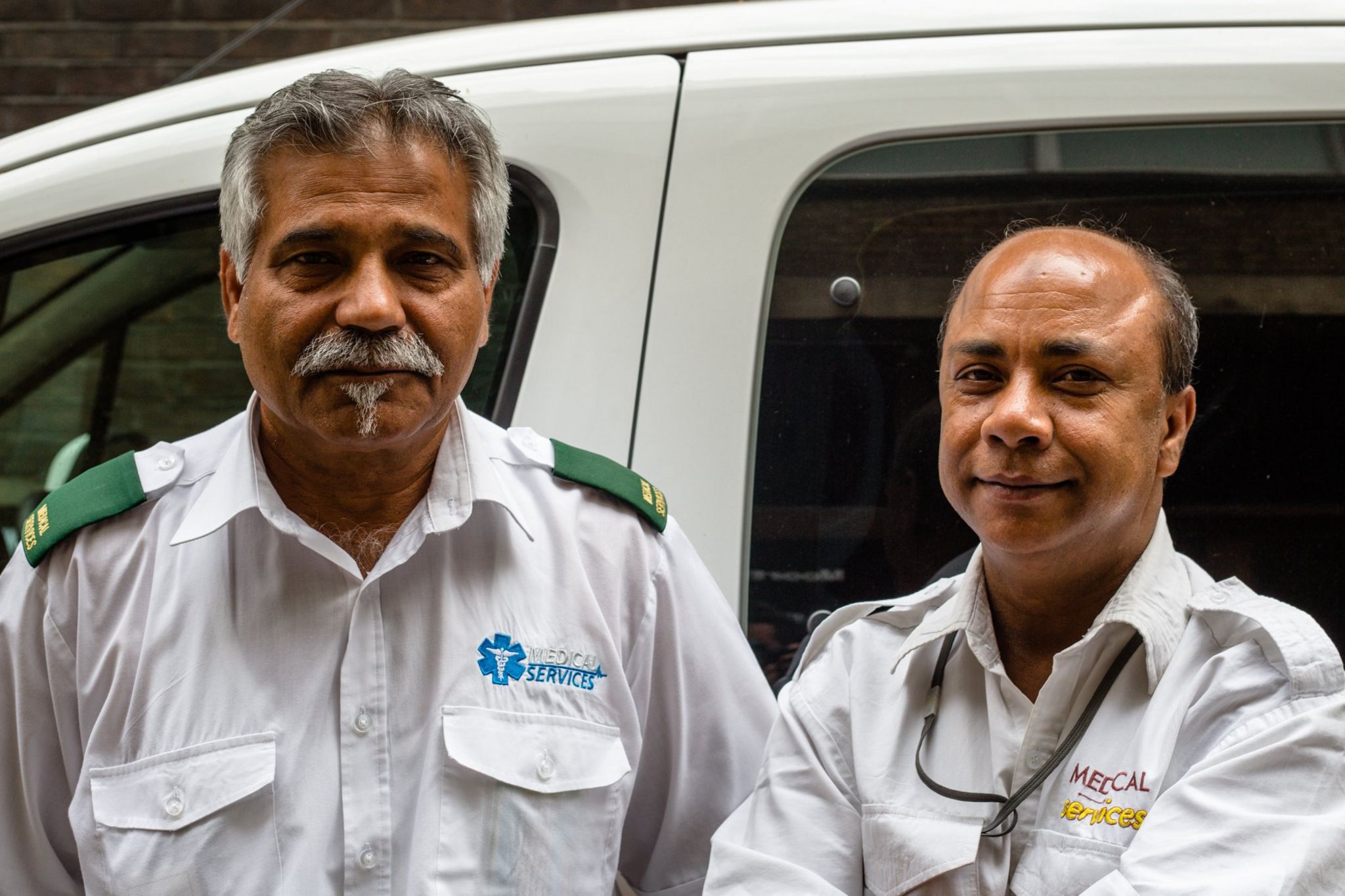 Khan (left) and Islam, Patient Transporters
