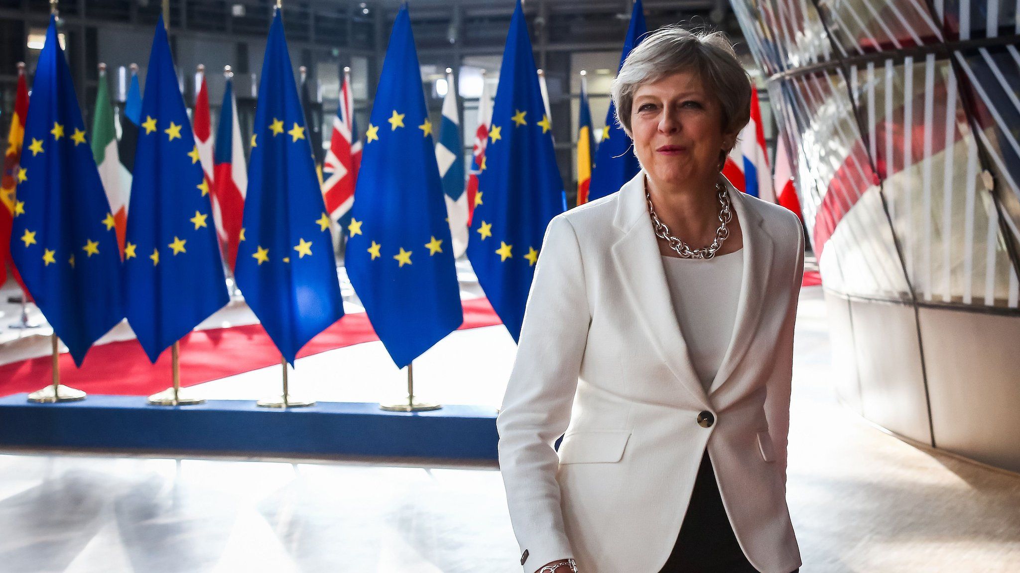 Theresa May arriving at EU Summit