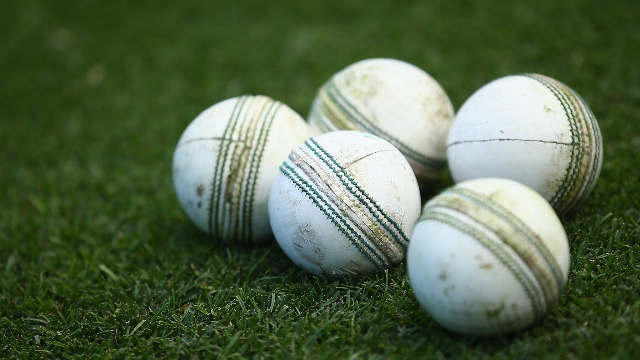 A stock image of white cricket balls