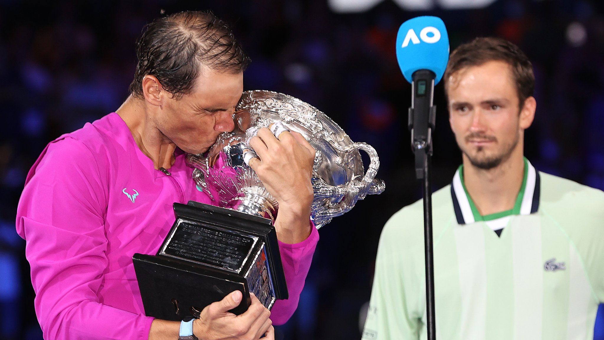 Nadal kisses trophy as Medvedev looks on
