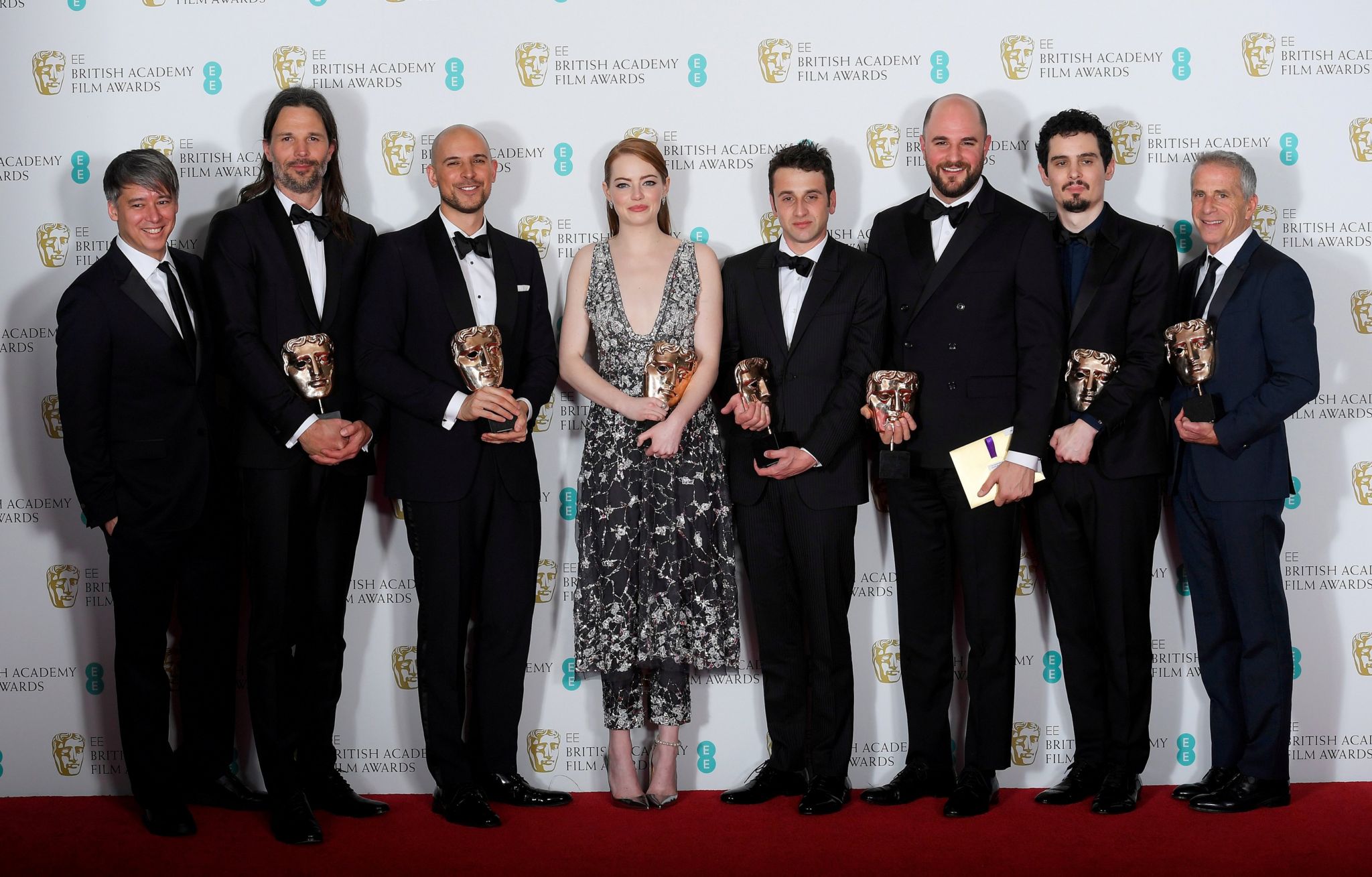 The team behind "La La Land" hold their awards for Best Film at the British Academy of Film and Television Awards (BAFTA) at the Royal Albert Hall in London, Britain on 12 February 2017