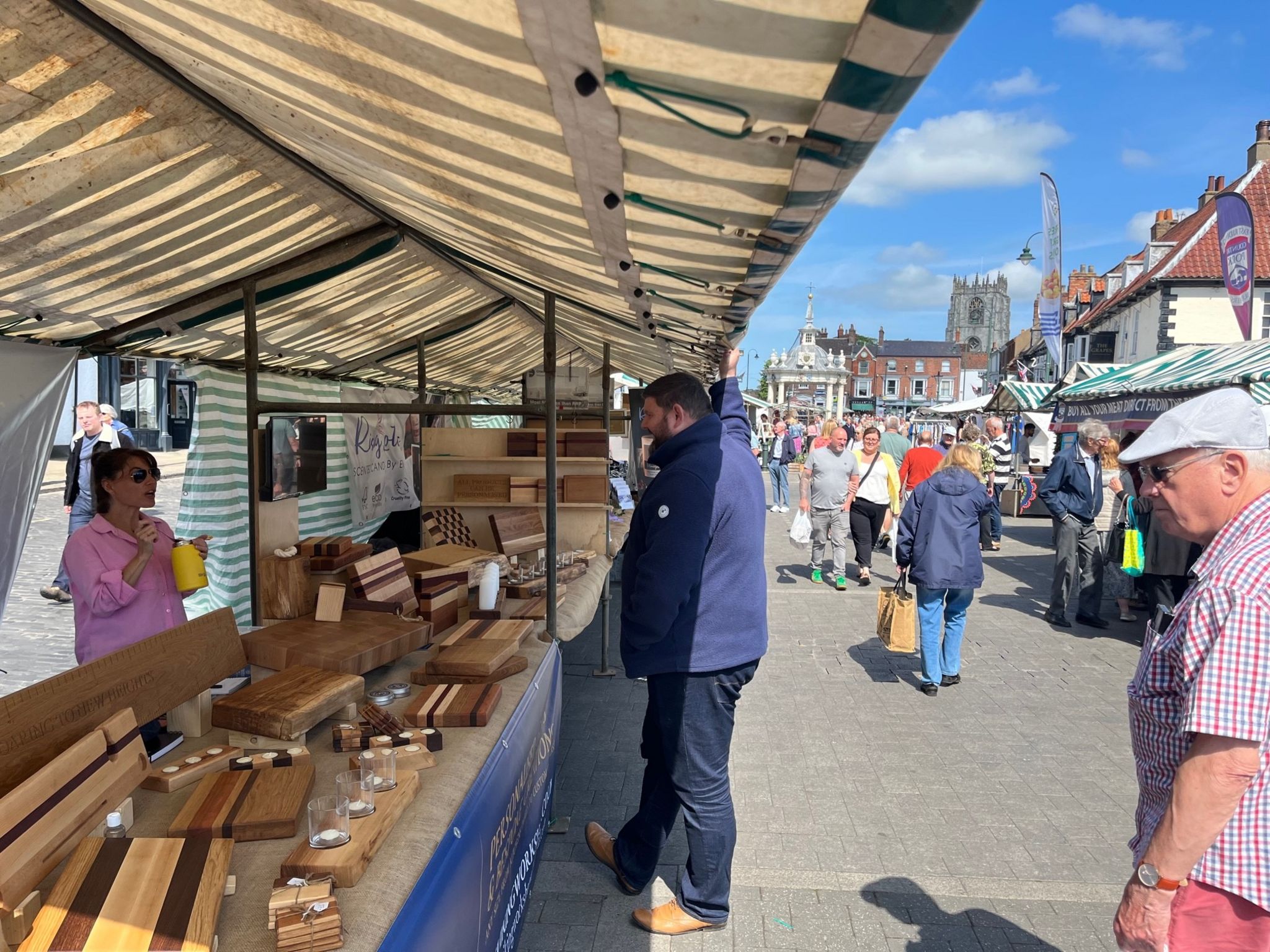 Market officer Richard Lascelles chats with a trader