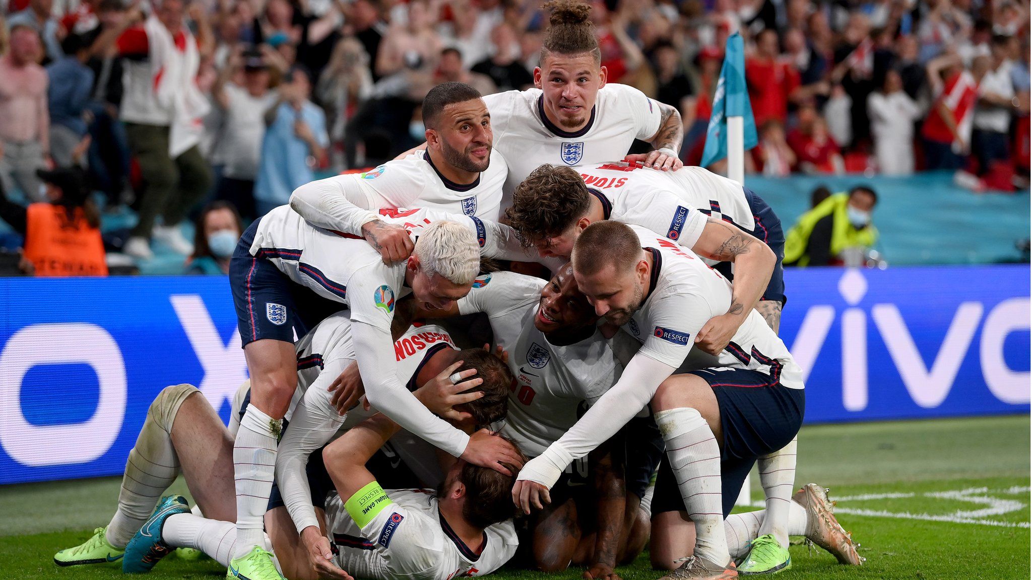 England's players celebrate after scoring against Denmark in the Euro 2020 semi-finals