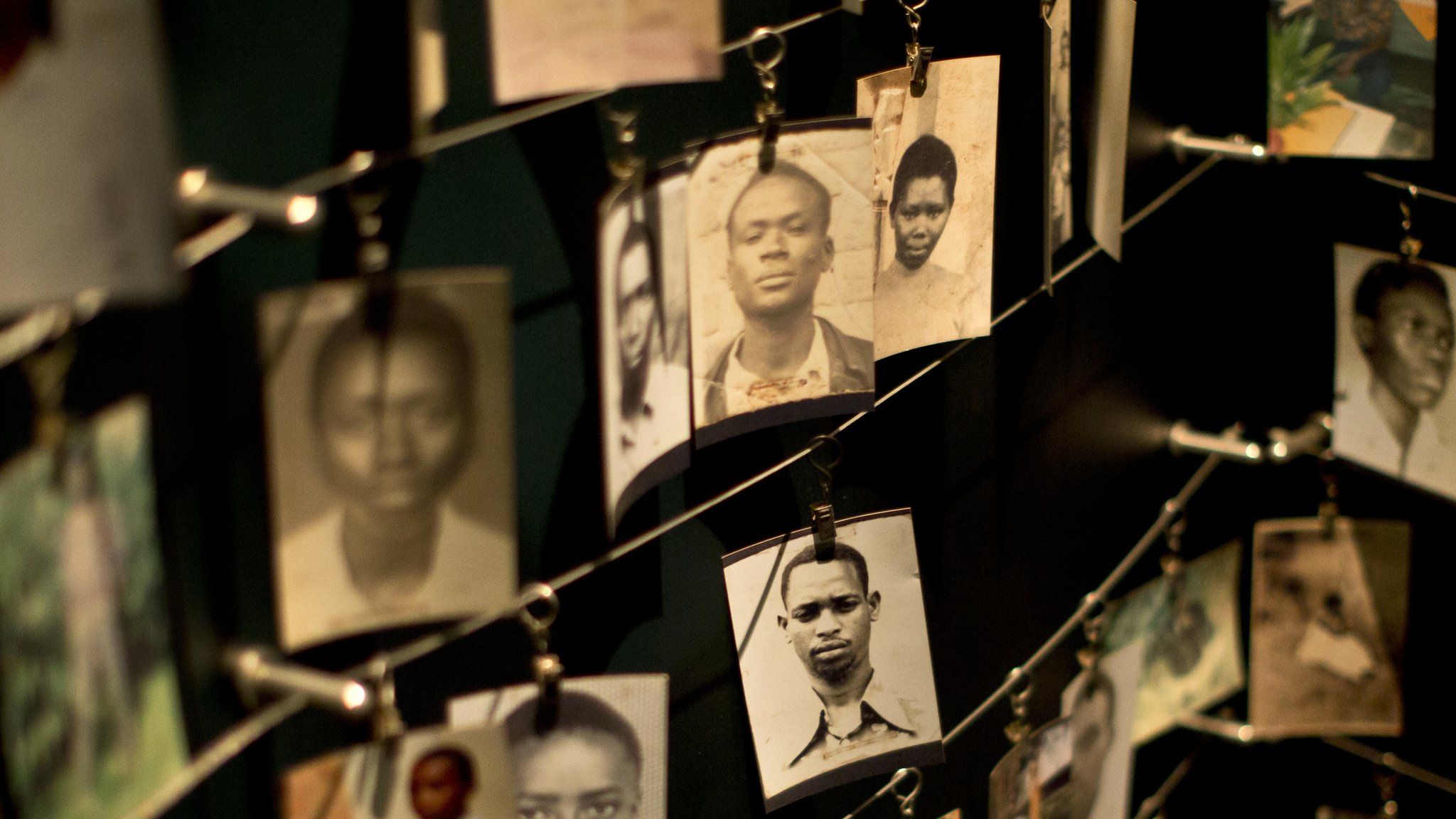 Photographs of some of those who died hang in a display in the Kigali Genocide Memorial Centre, Rwanda. 5 April 2015