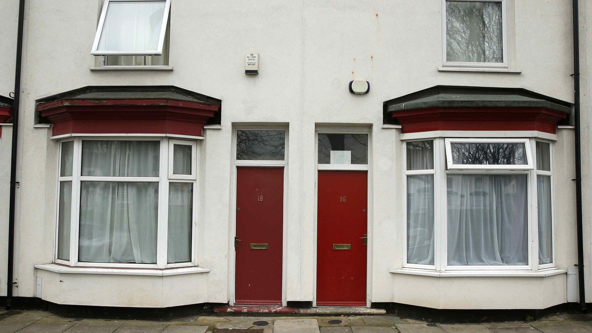 Homes with doors painted red