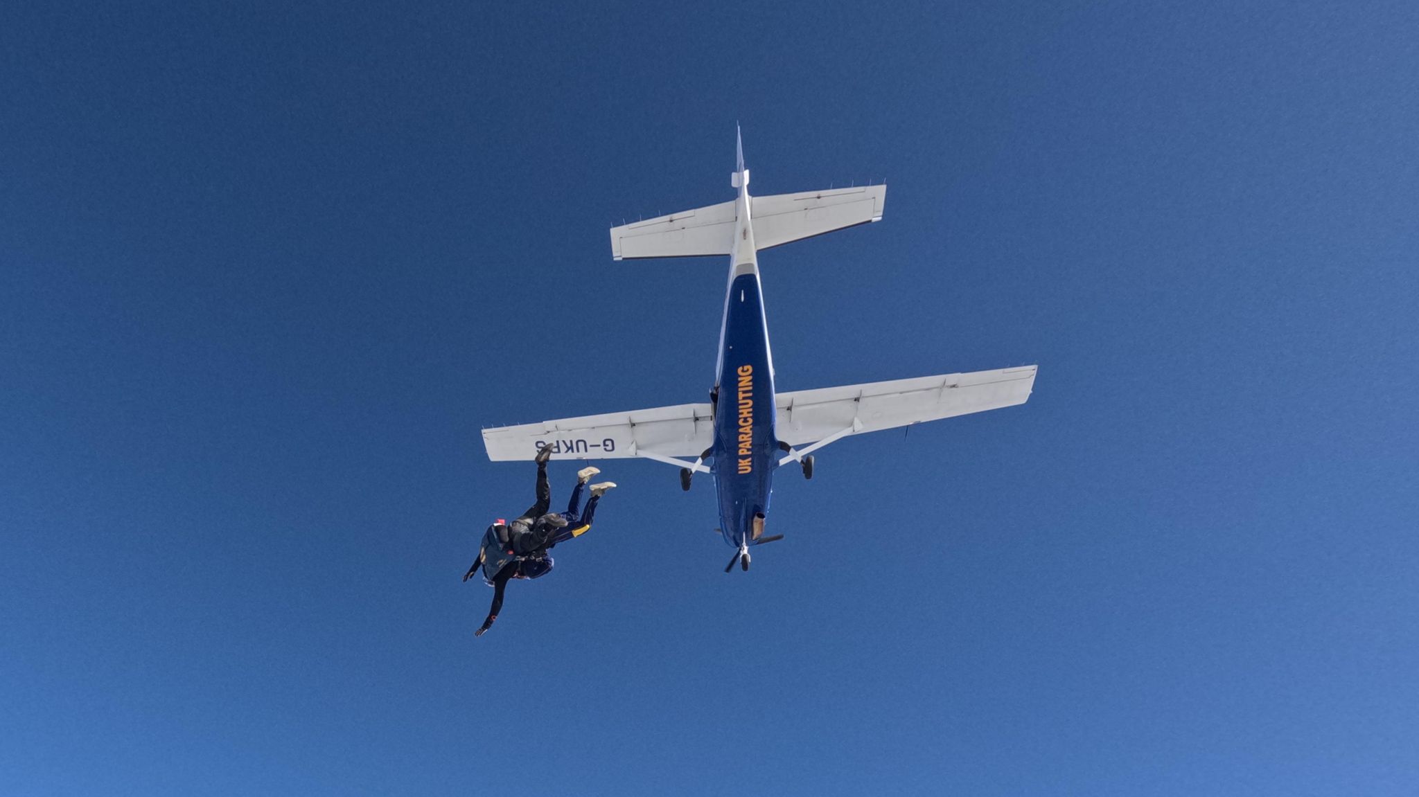 Jake McCandless as he begins his sky dive