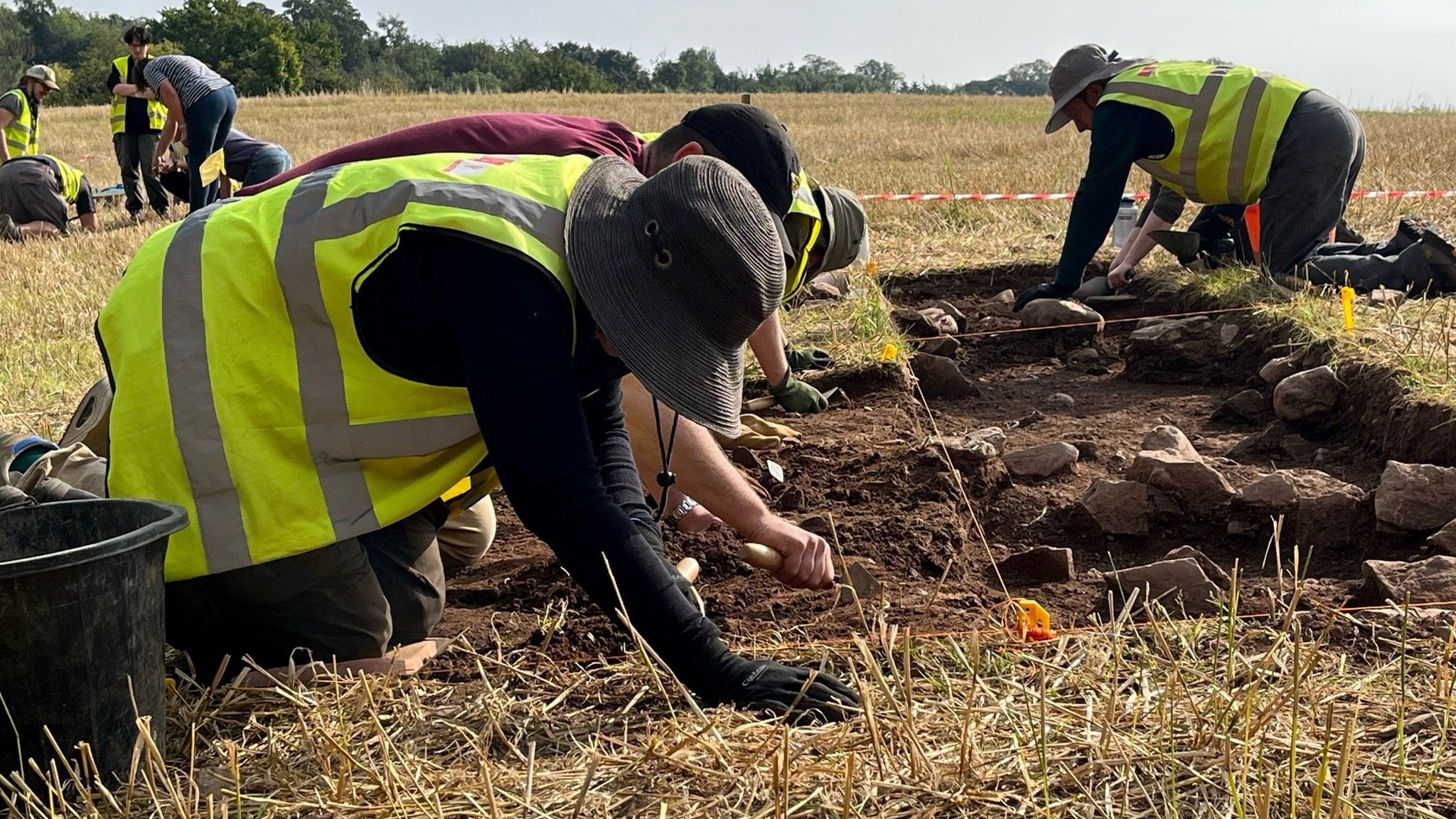 Archaeologists excavating the site