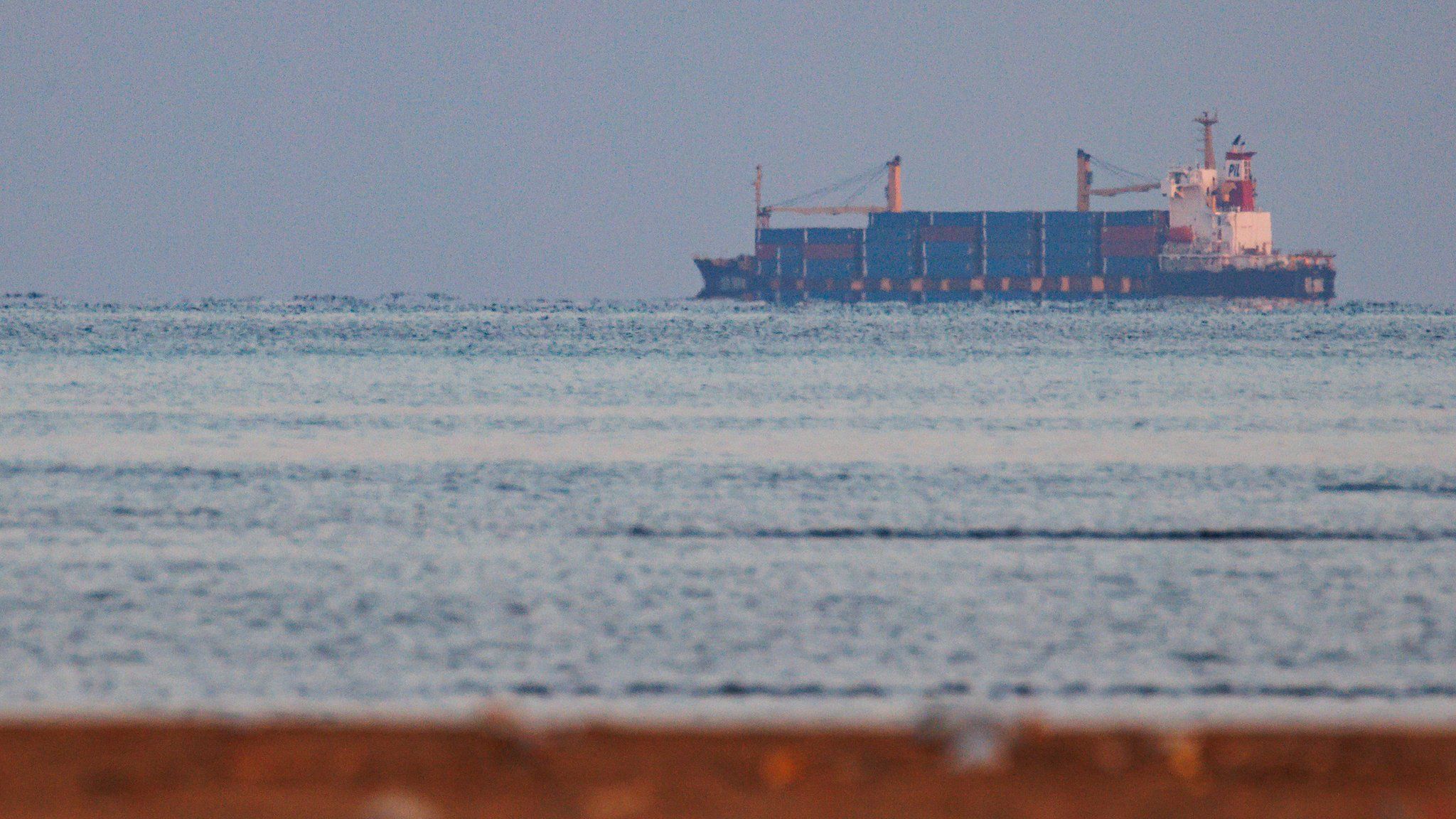 File photo showing a container ship approaching the Bab al-Mandab Strait off Obock, Djibouti (18 January 2024)