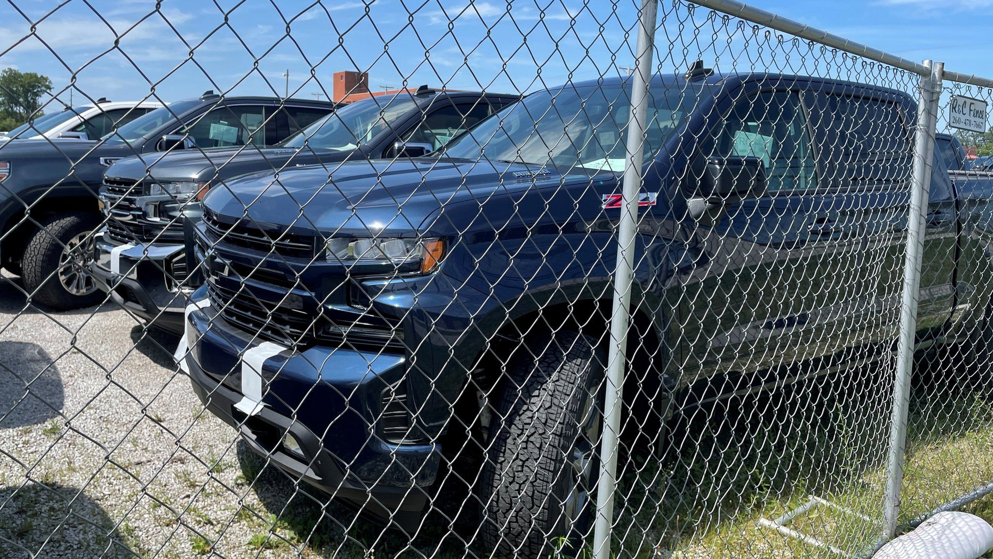 General Motors pickup trucks awaiting missing parts are seen in Fort Wayne, Indiana, U.S. August 14, 2021.