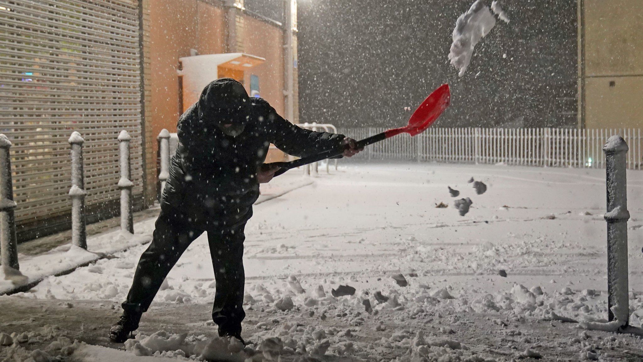 Man clearing snow