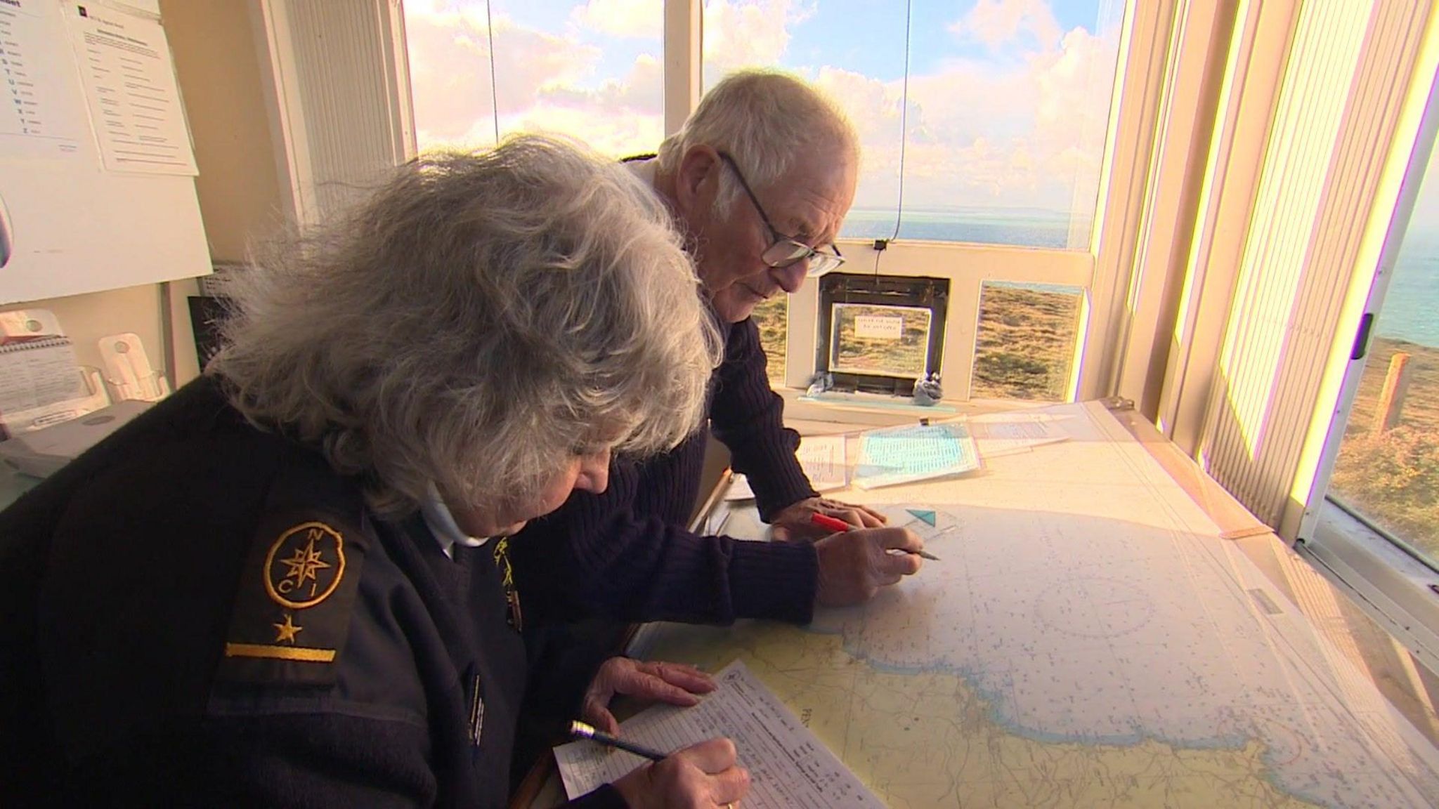 Debbie Edwards and Mark Weston surveying a map