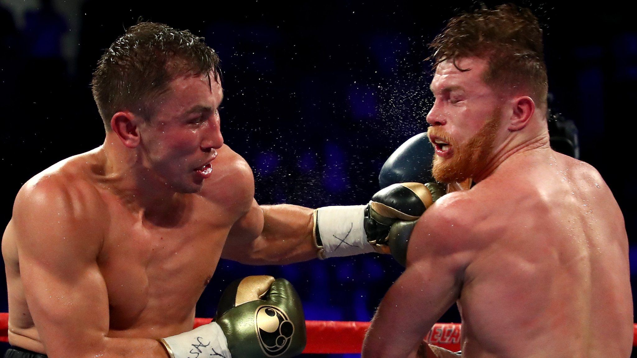 Gennady Golovkin punches Saul Alvarez during their world middleweight title fight in September 2017