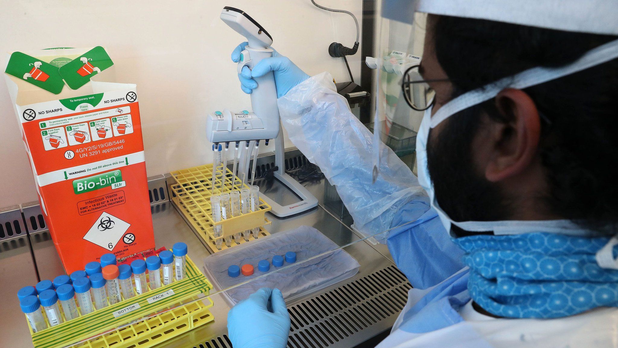 A technician carrying out tests for coronavirus at Queen Elizabeth University Hospital, Glasgow