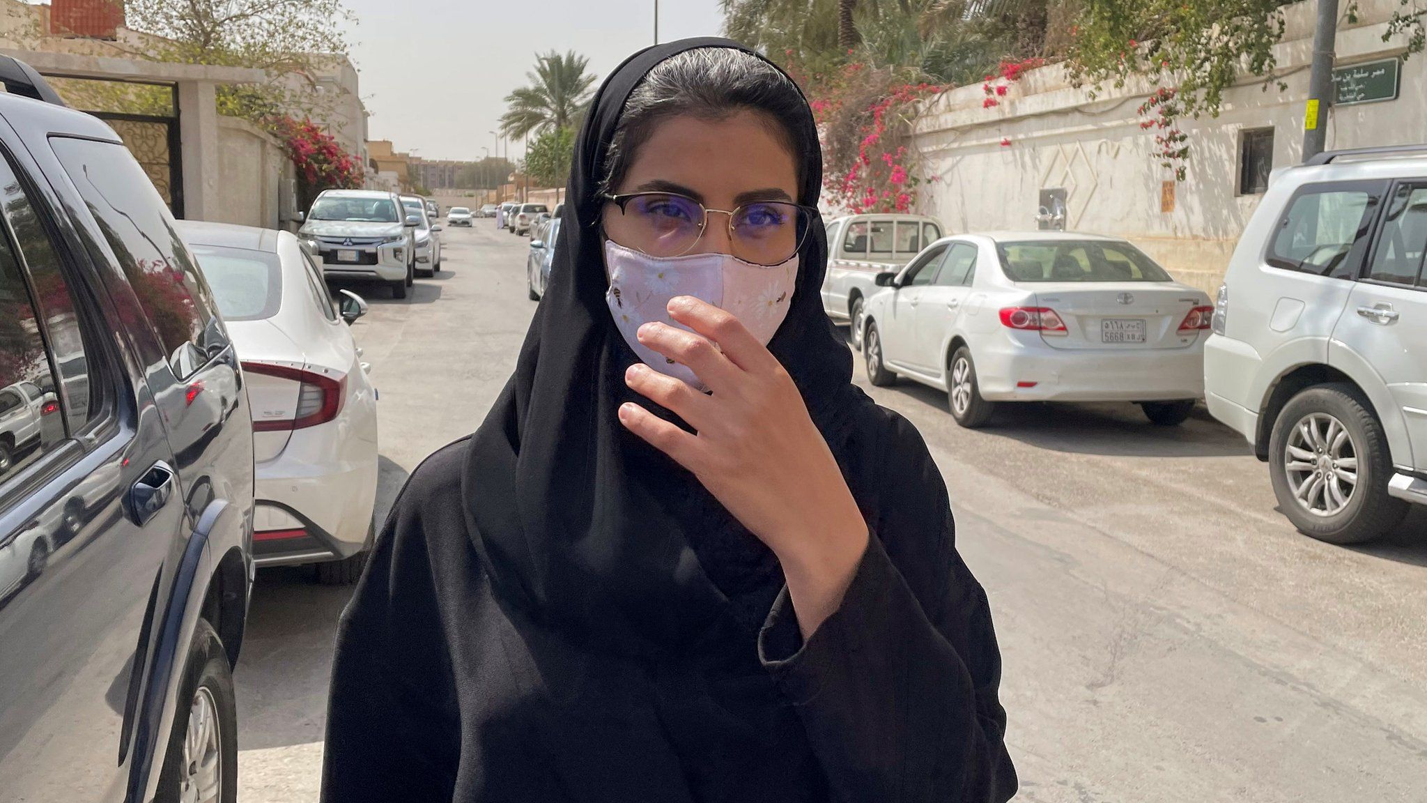 Loujain al-Hathloul walks to an appeal hearing at a court in Riyadh, Saudi Arabia (10 March 2021)
