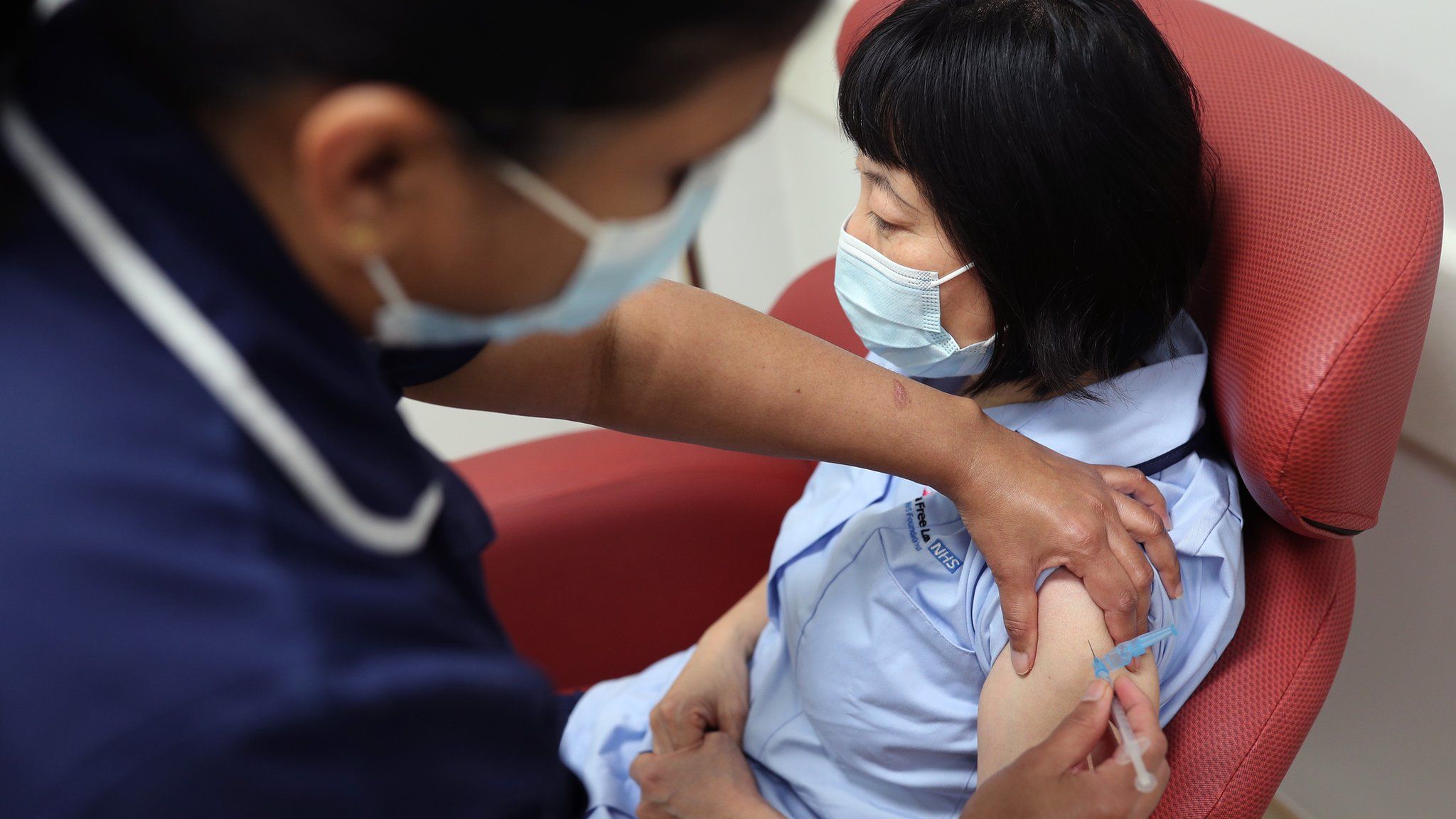 Nurses at the Royal Free Hospital, London, simulate the administration of the Pfizer vaccine to support staff training ahead of the rollout