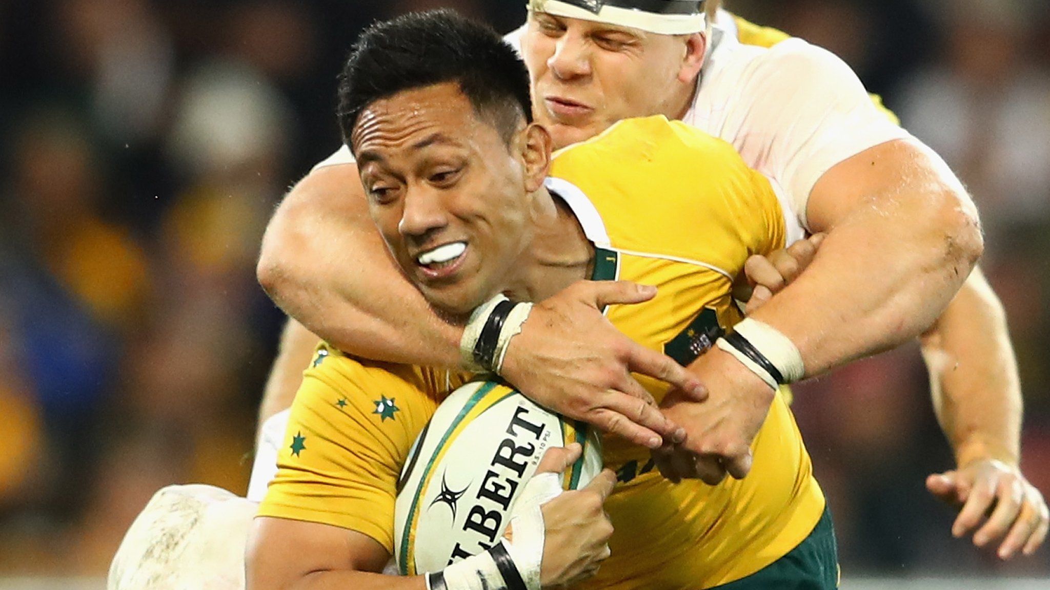 Christian Lealiifano is tackled during the game against England in Melbourne last year
