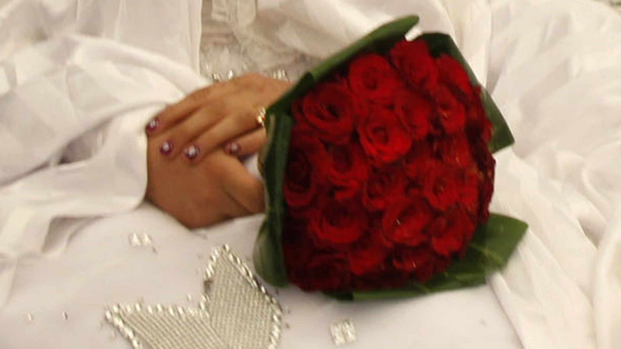 A bride holds a bouquet during a wedding ceremony in Amman (file photo)