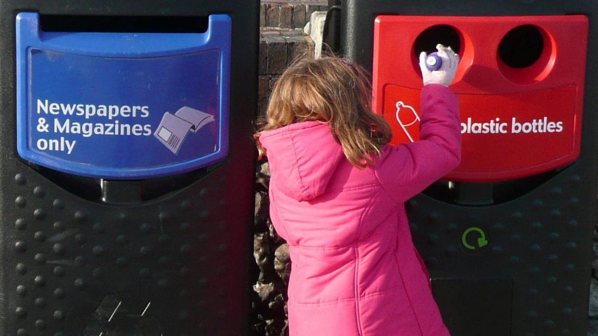 girl recycling