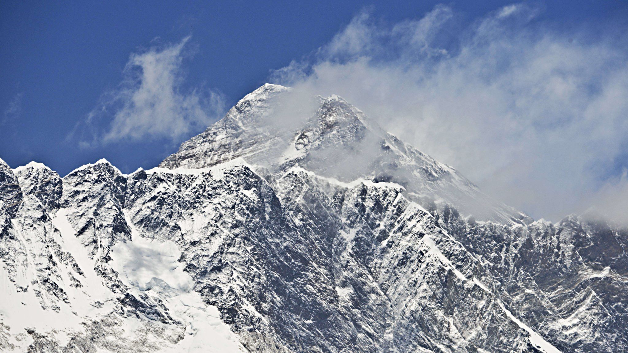 Everest, viewed from a distance, with clear skies