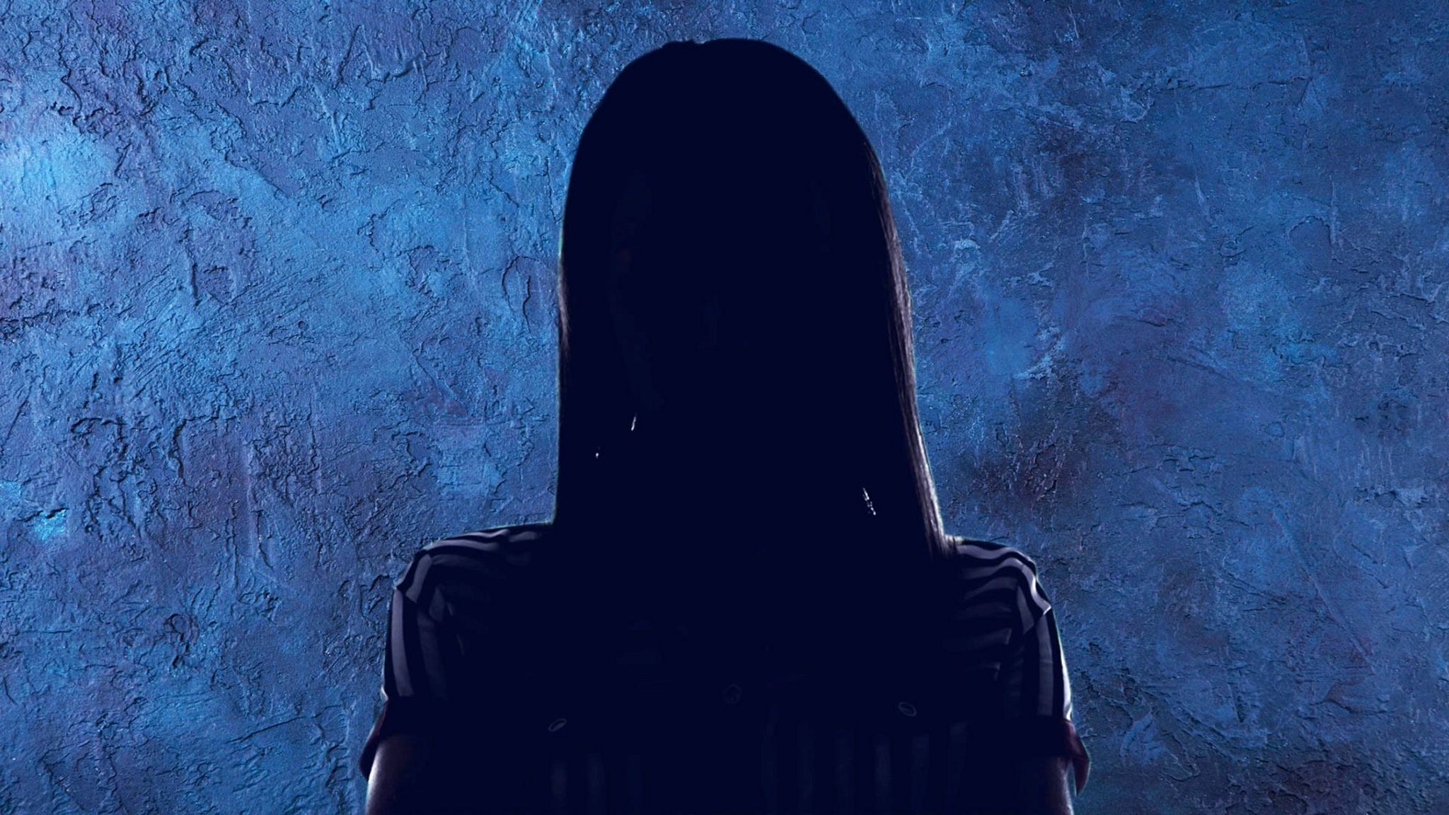 Silhouette of a woman with a blue background - the woman is not "Catherine"