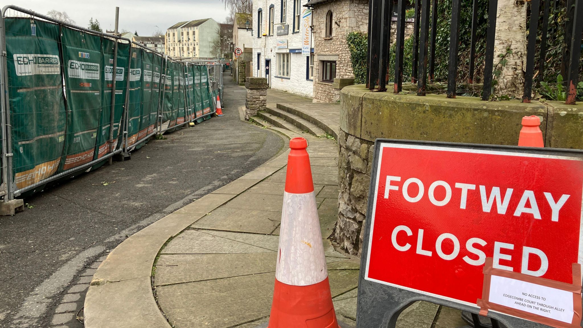 A "footway closed" sign in front of construction