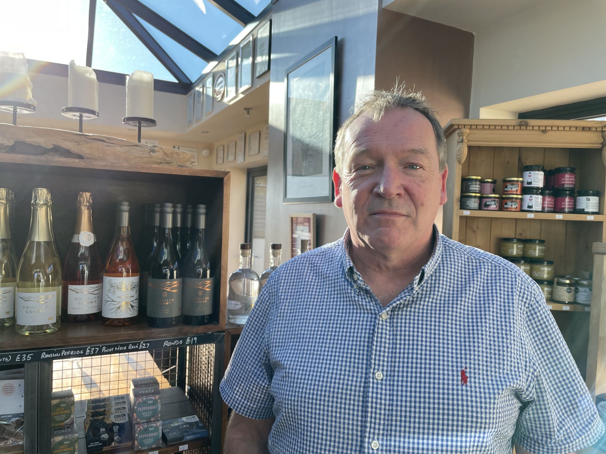 Colin Bennett, owner of Gwinllan Conwy Vineyard, in his vineyard shop