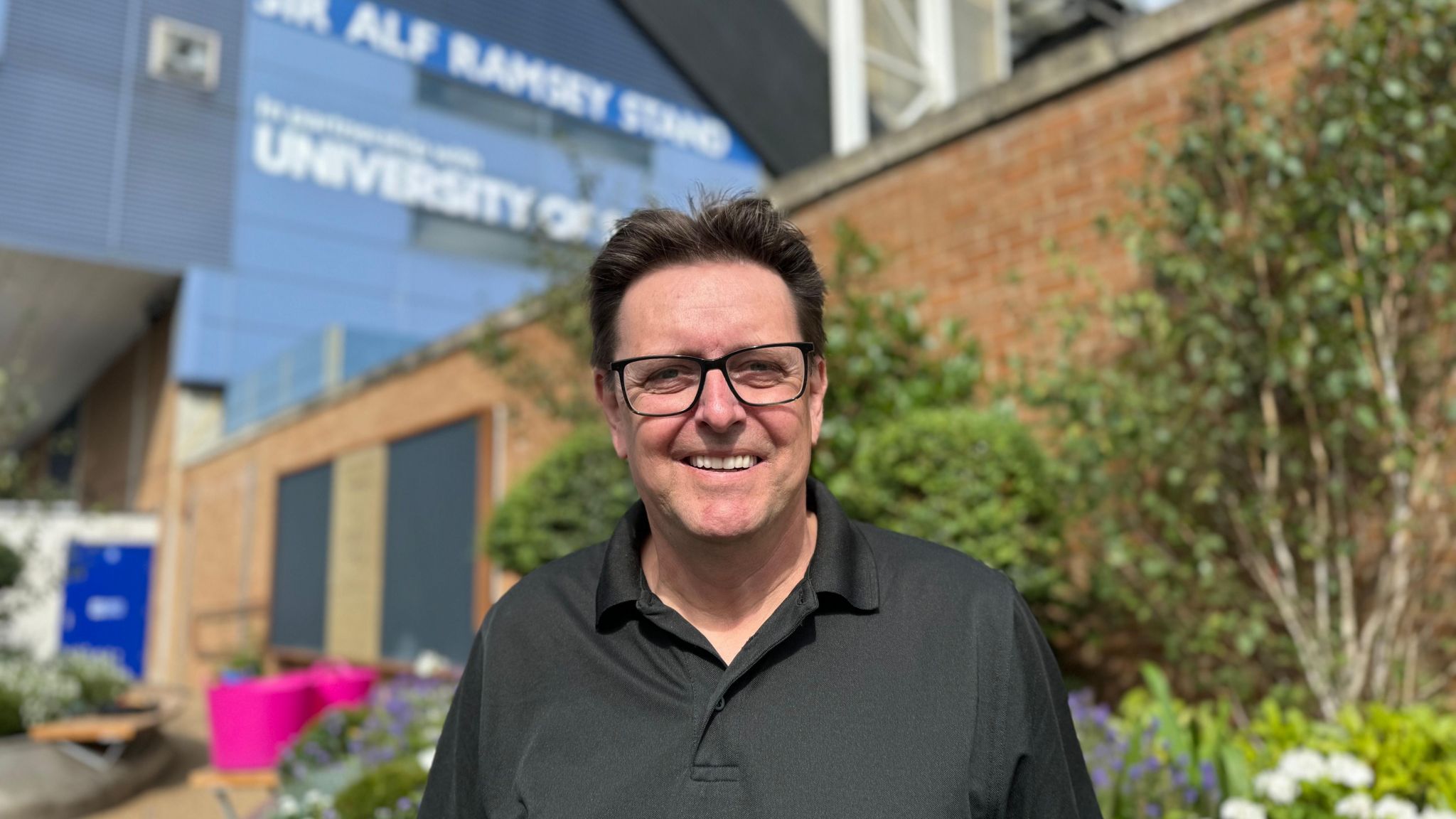 Stuart Andrews pictured outside Portman Road stadium at the Ipswich Town memorial garden