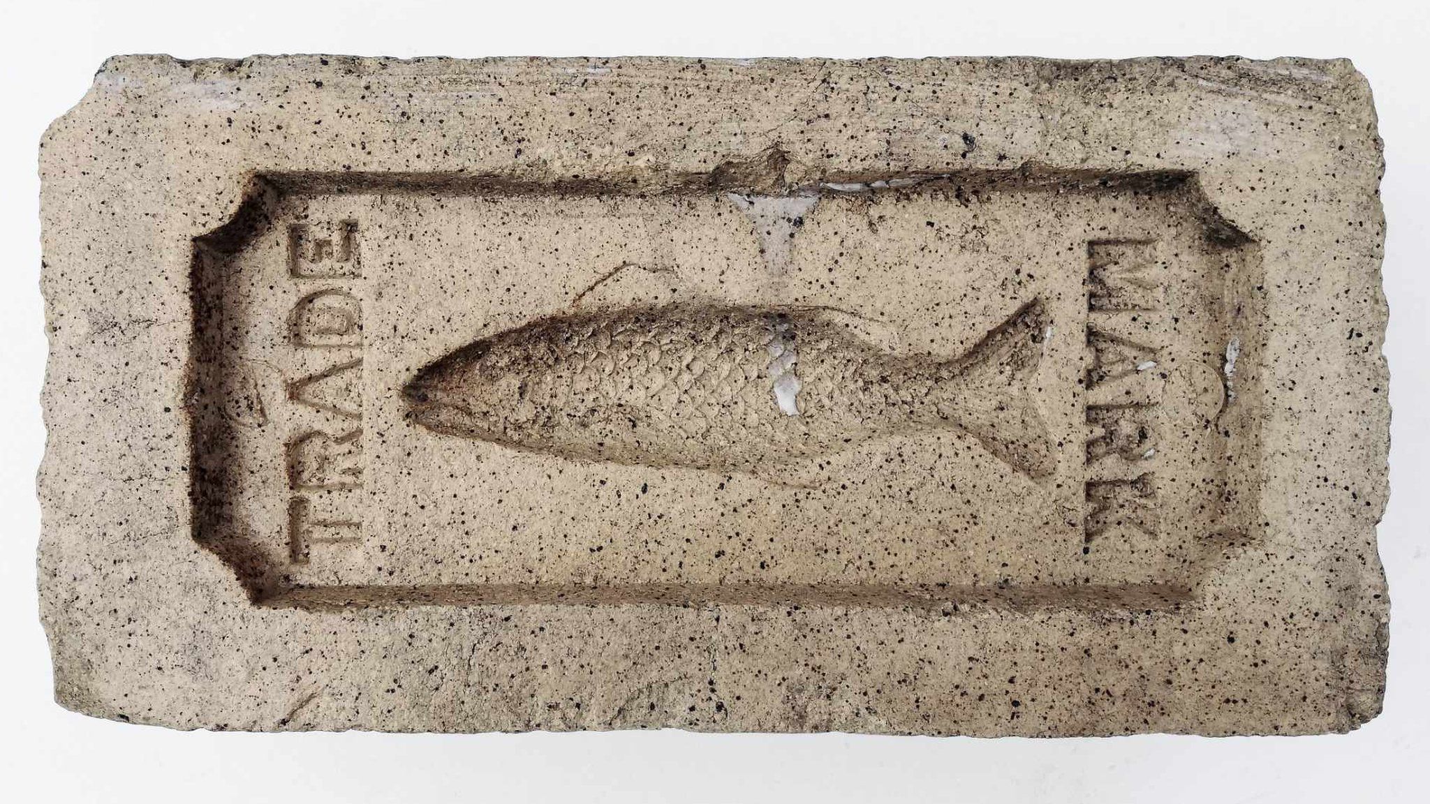 Brick stamped with the trademark of a salmon