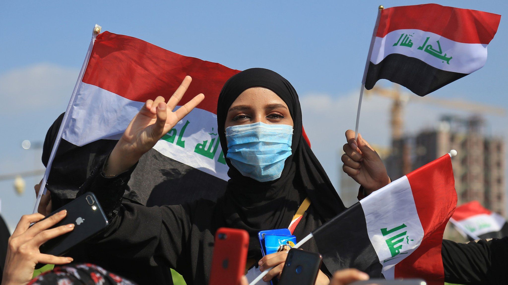 An Iraqi woman takes part in an anti-government protest in the central city of Karbala (31 October 2019)