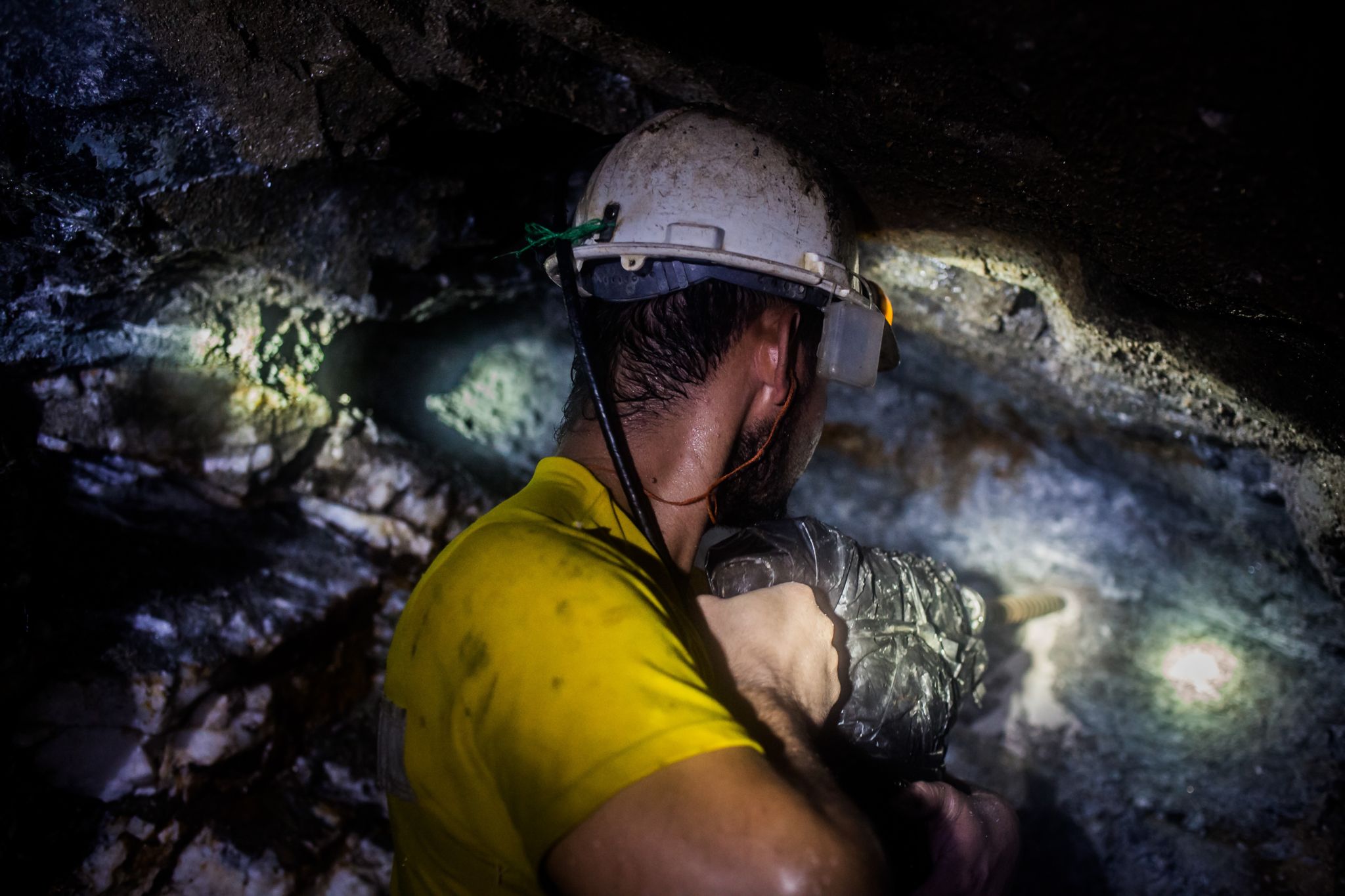A worker in an underground gold mine.