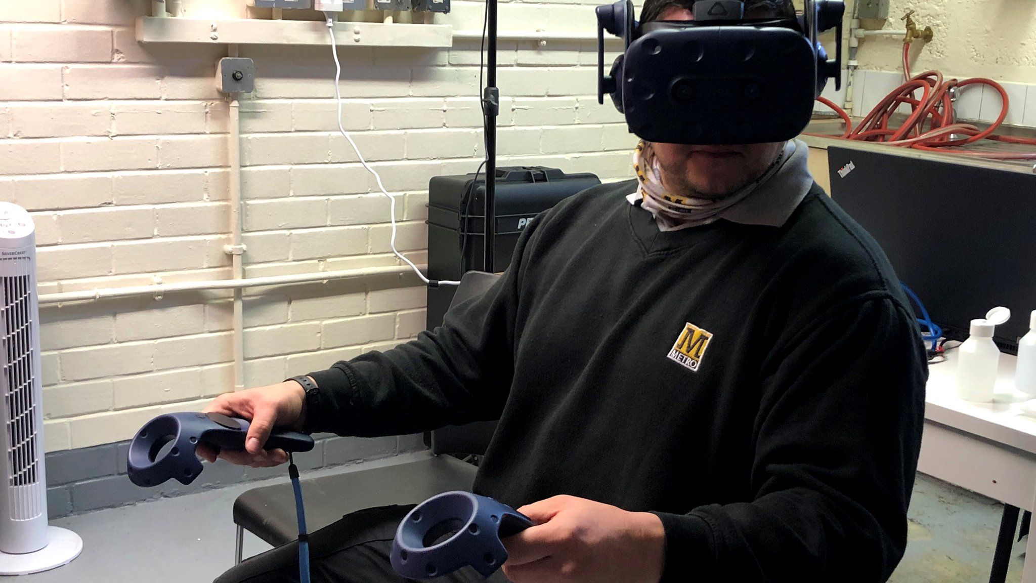Metro driver Craig Pearson using the VR headset