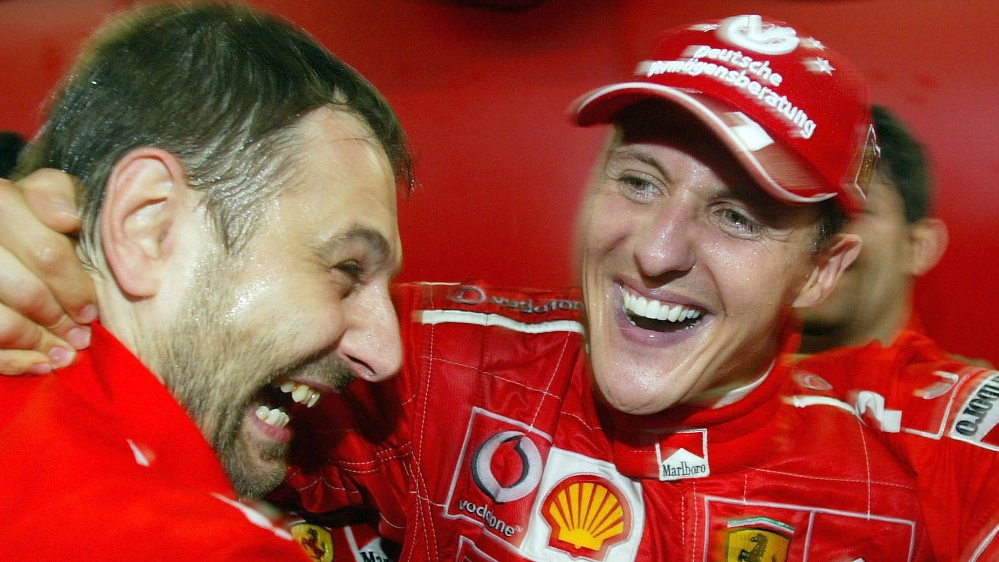 Michael Schumacher celebrates winning the 2003 world drivers' title with Ferrari