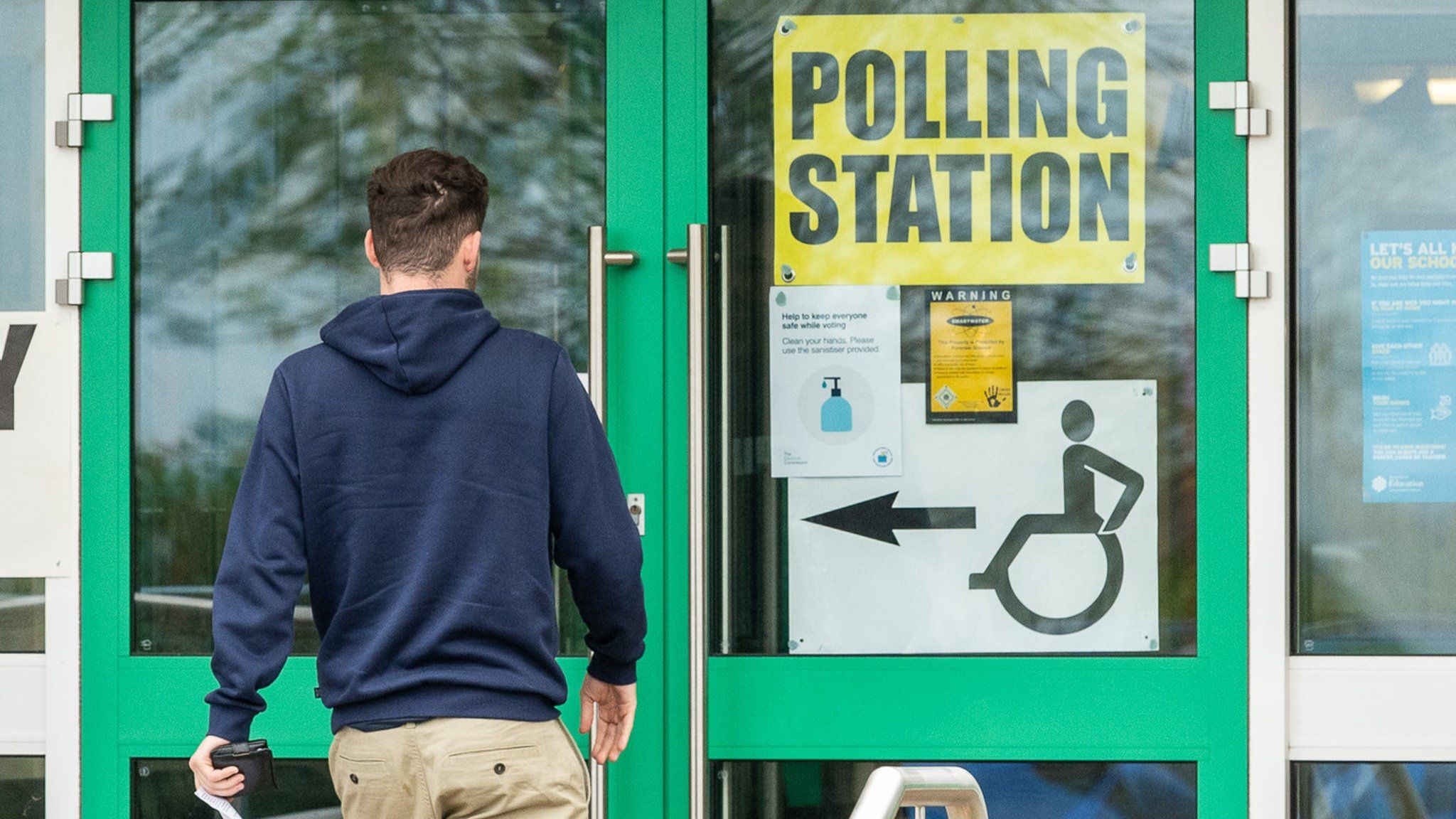 A man walks into a polling station