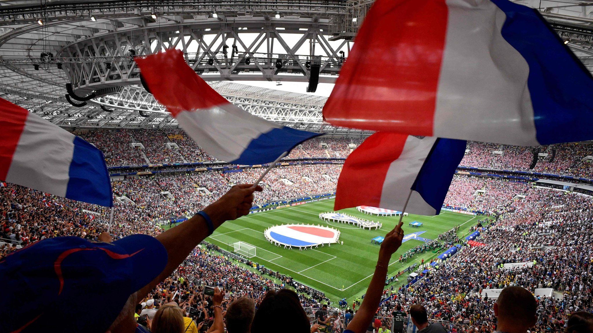 Fans wave French flags in Russia